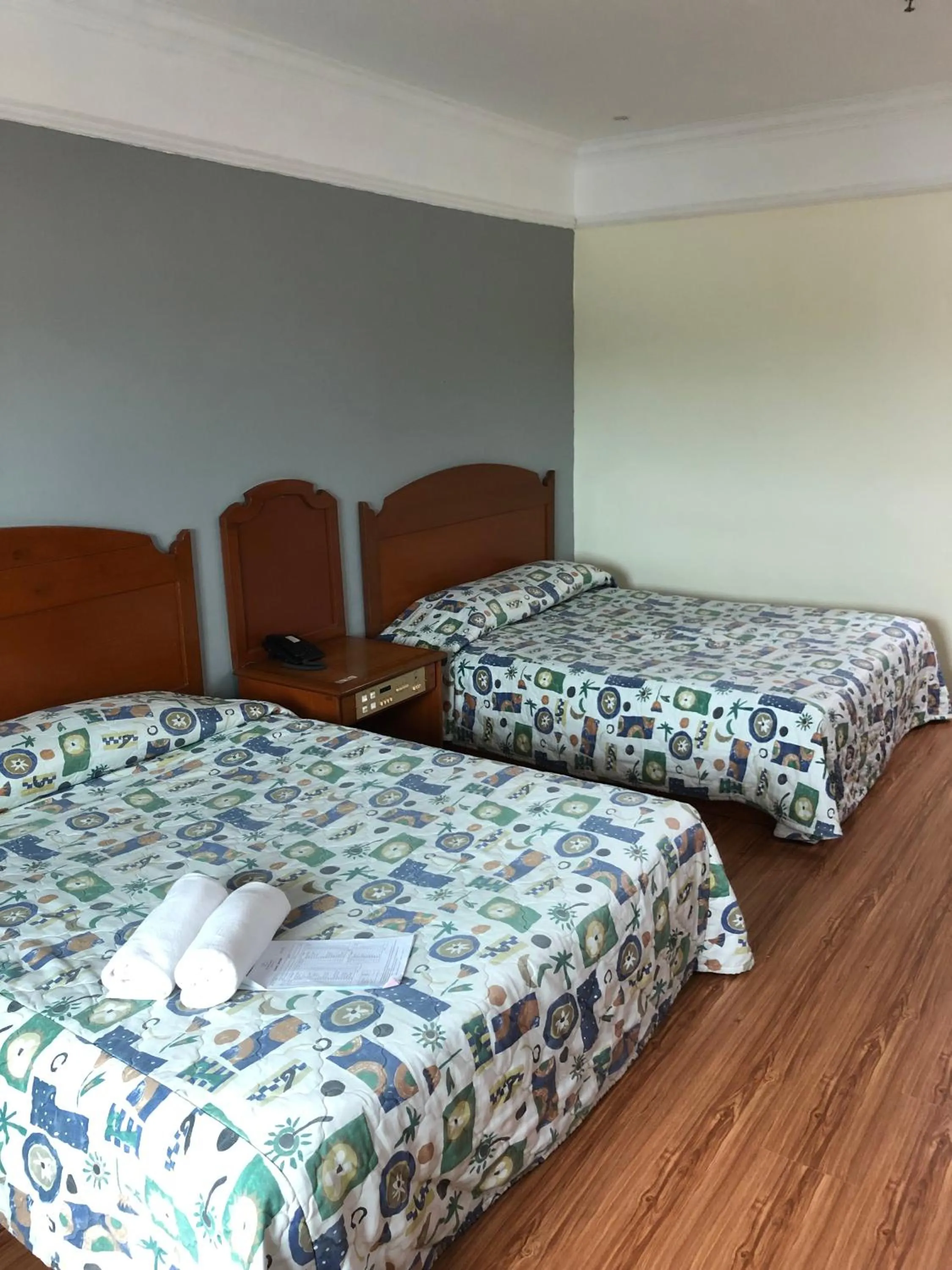 Bed in Purnama Hotel