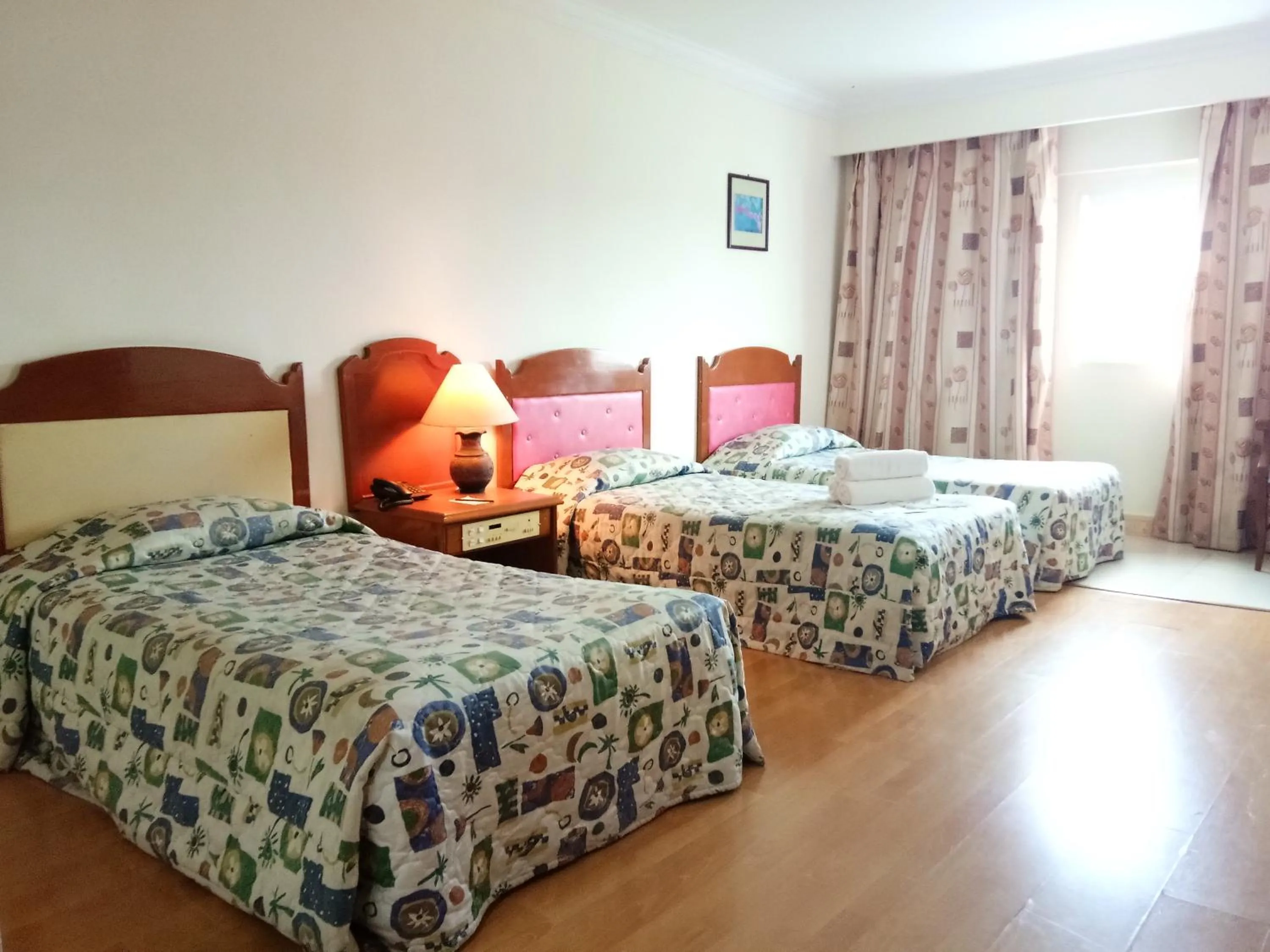 Bed in Purnama Hotel