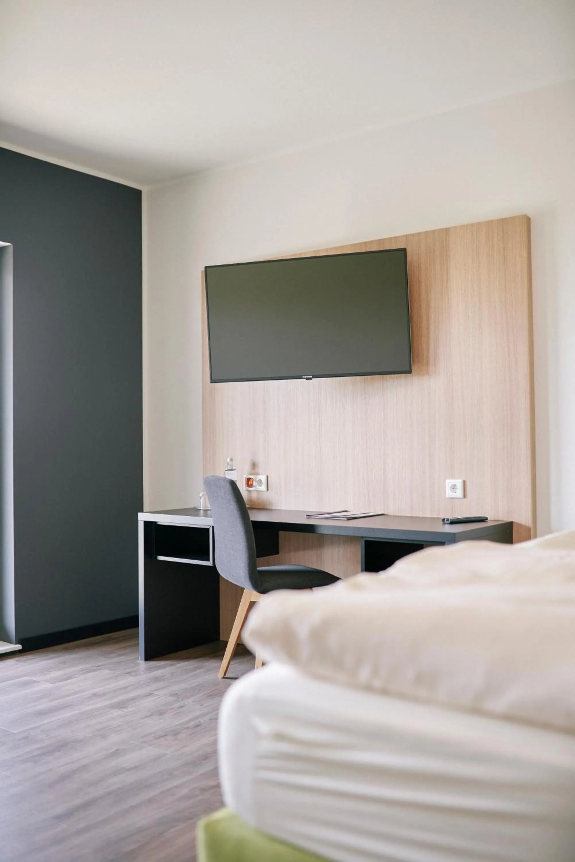 Photo of the whole room, Bed in FETZ DAS LORELEY HOTEL