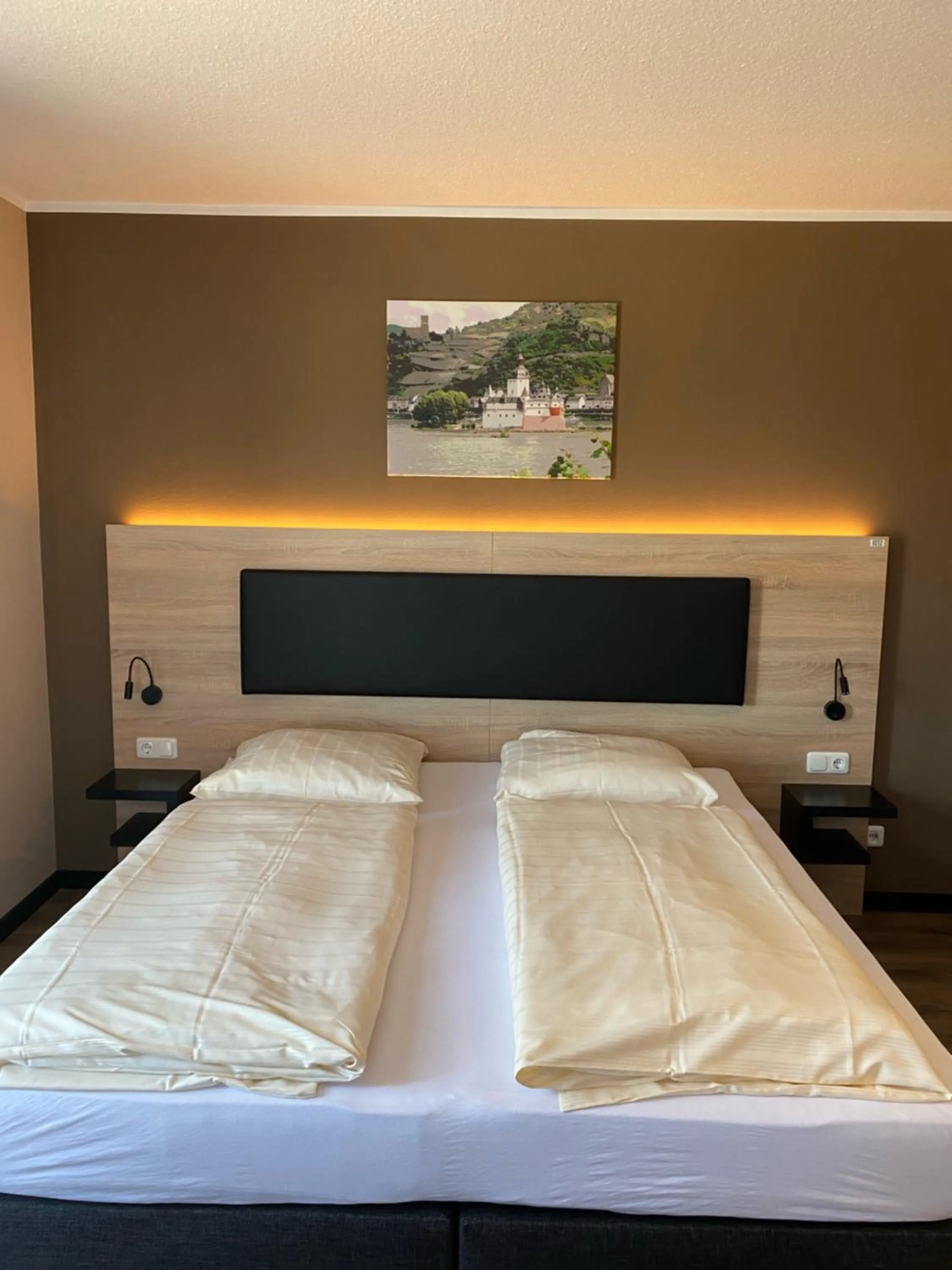 Bed in FETZ DAS LORELEY HOTEL