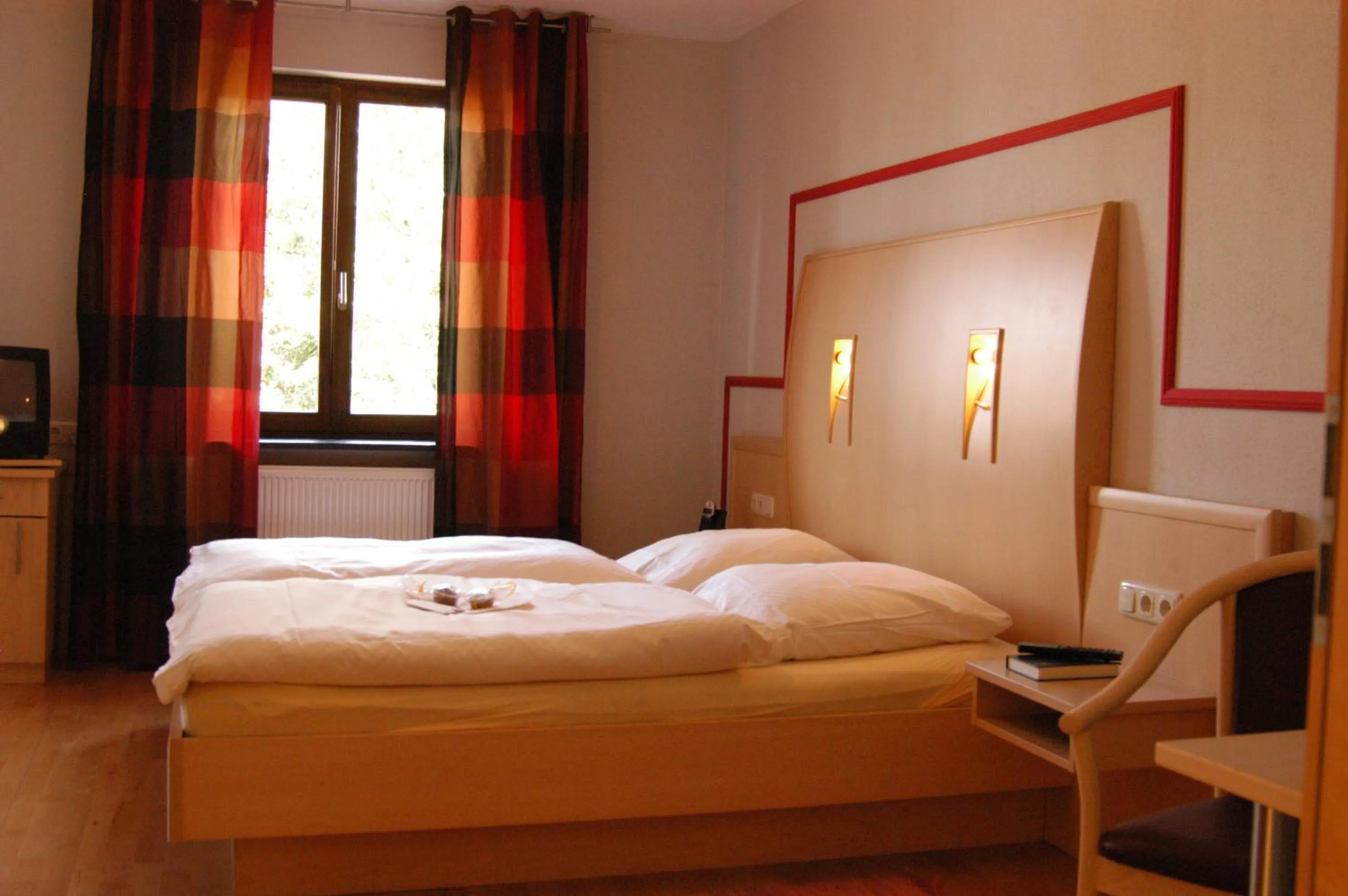 Bed in FETZ DAS LORELEY HOTEL