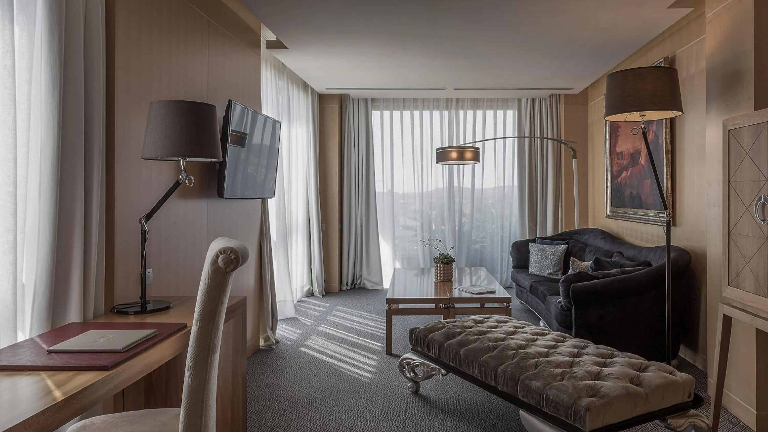 Communal lounge/ TV room in Hotel MiM Sitges & Spa