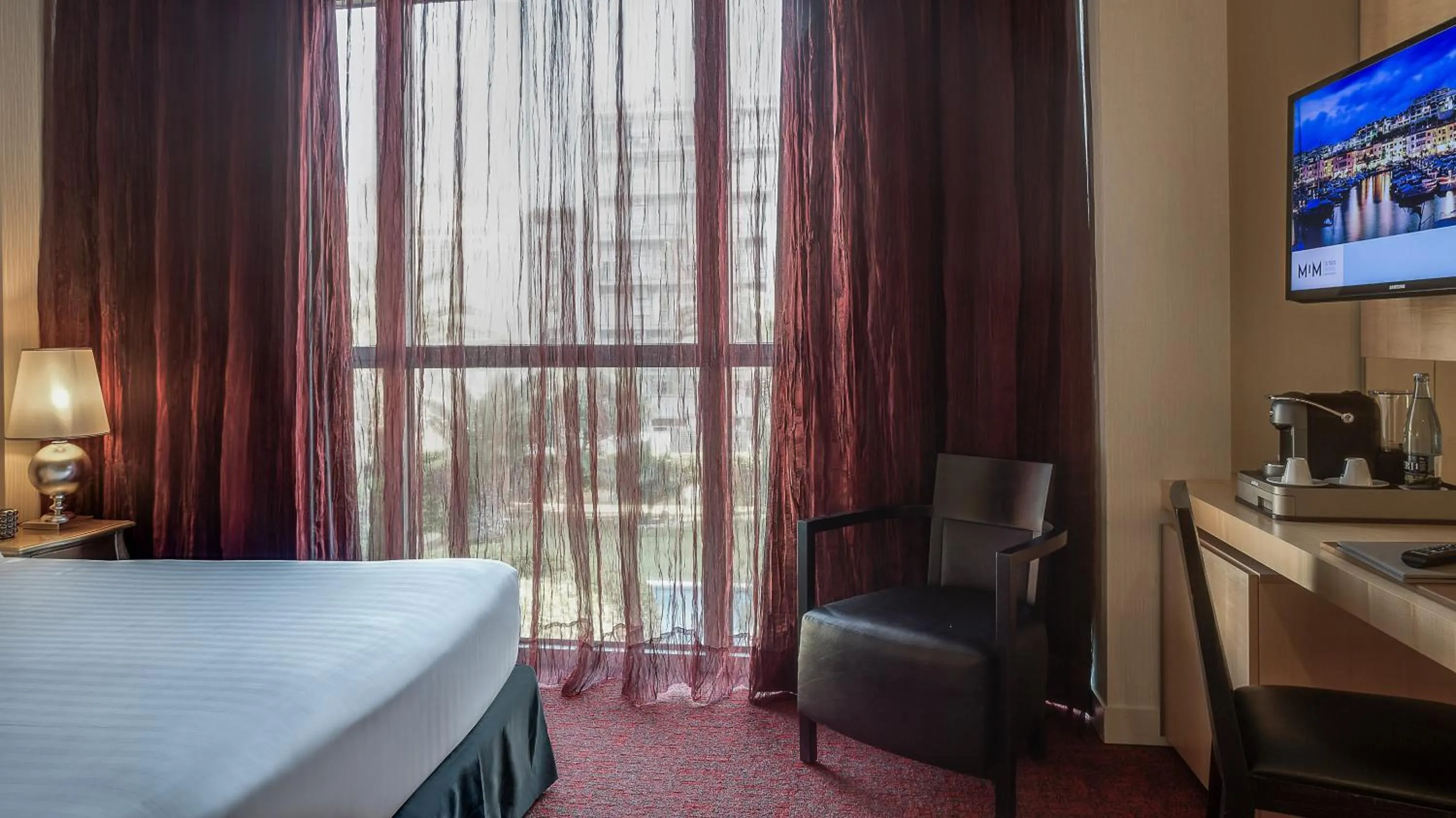 Bed in Hotel MiM Sitges & Spa