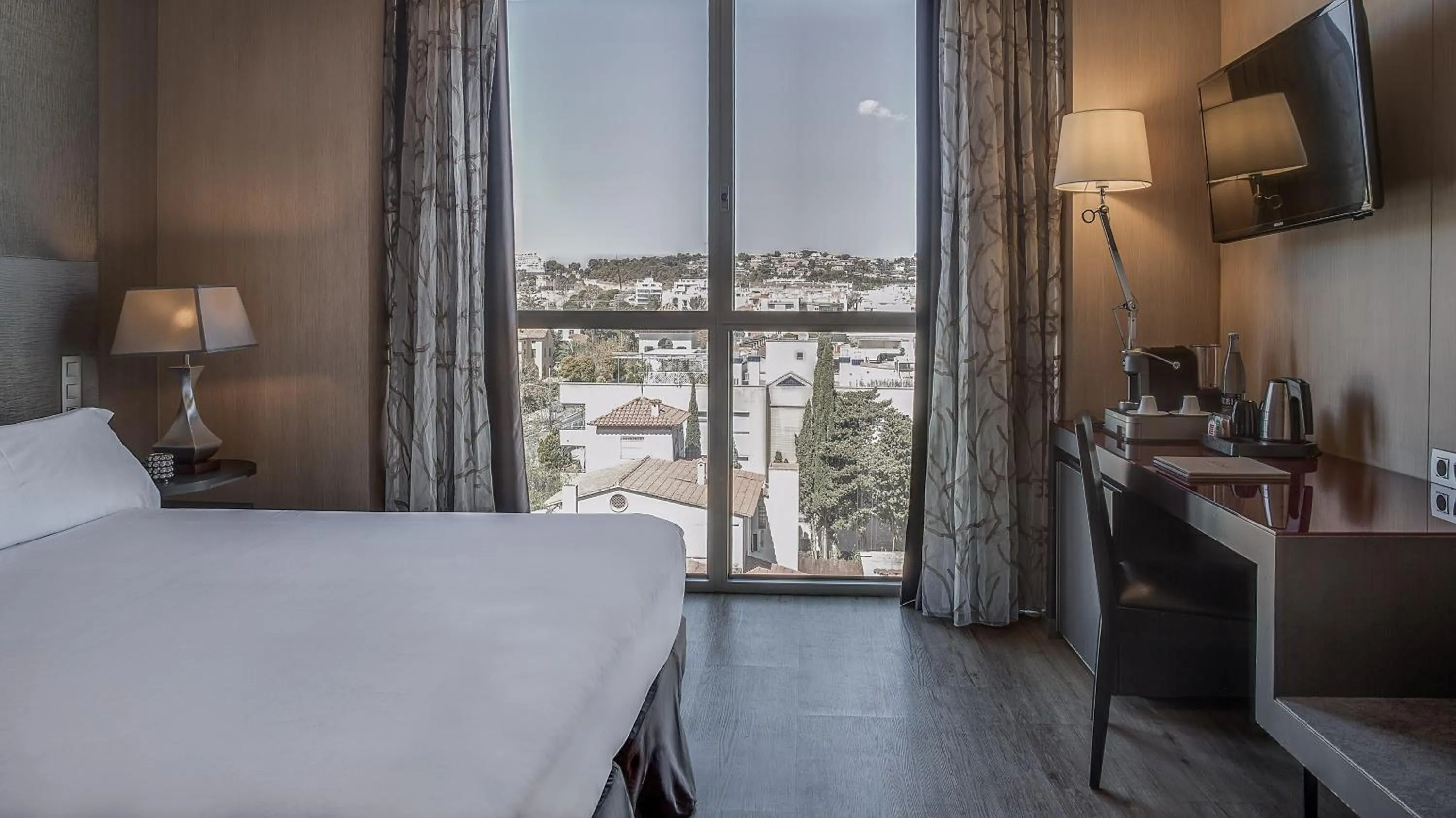 Bed in Hotel MiM Sitges & Spa