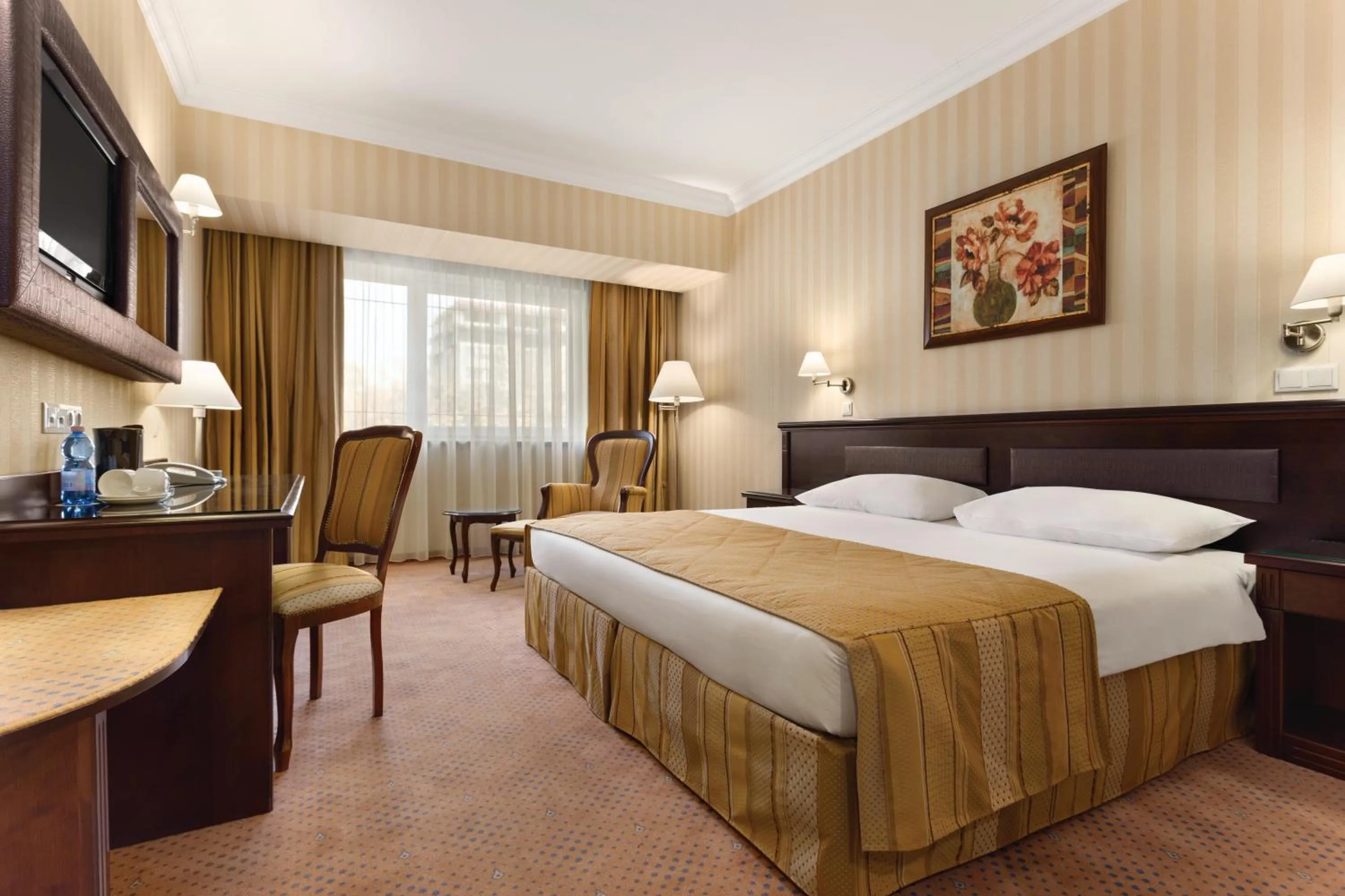 Photo of the whole room, Bed in Ramada Hotel & Suites by Wyndham Bucharest North