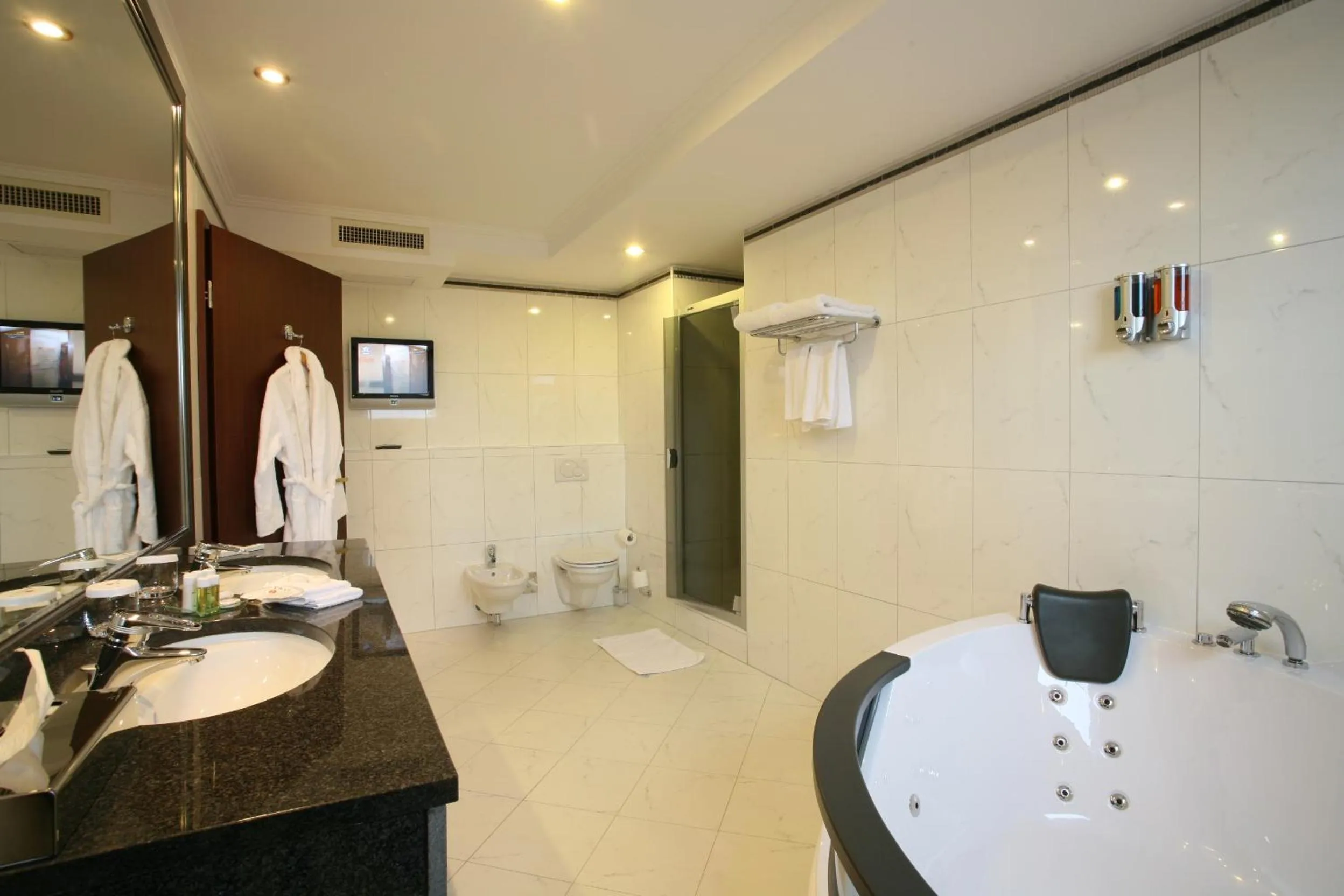 Bathroom in Ramada Hotel & Suites by Wyndham Bucharest North