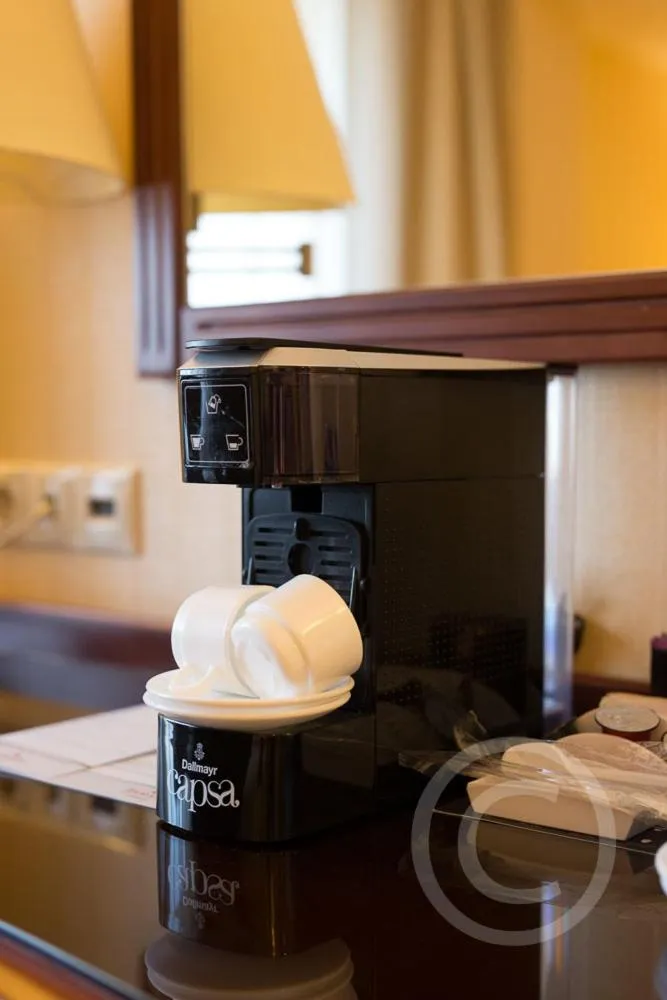 Bed in Ramada Hotel & Suites by Wyndham Bucharest North