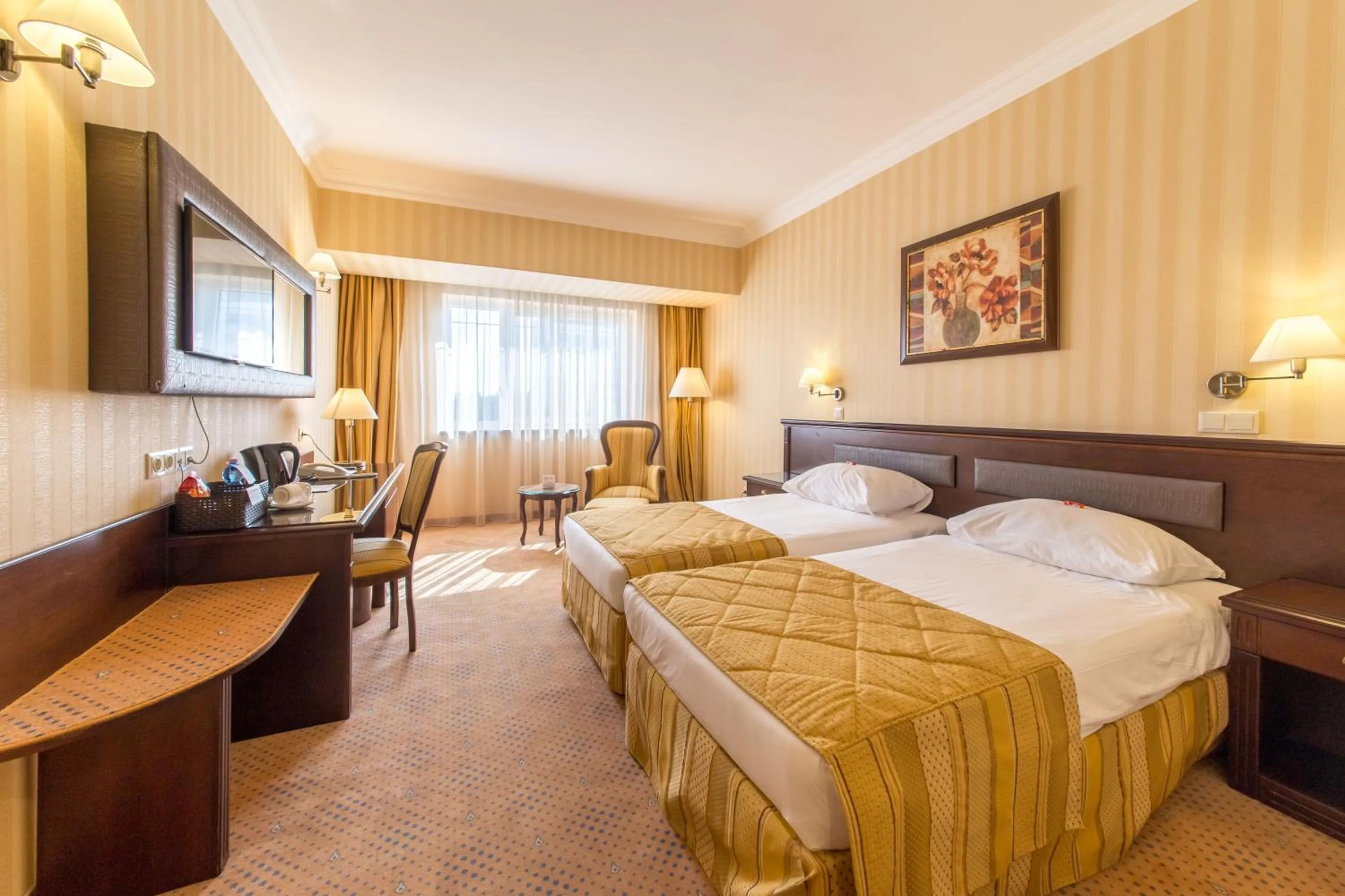 Bed in Ramada Hotel & Suites by Wyndham Bucharest North