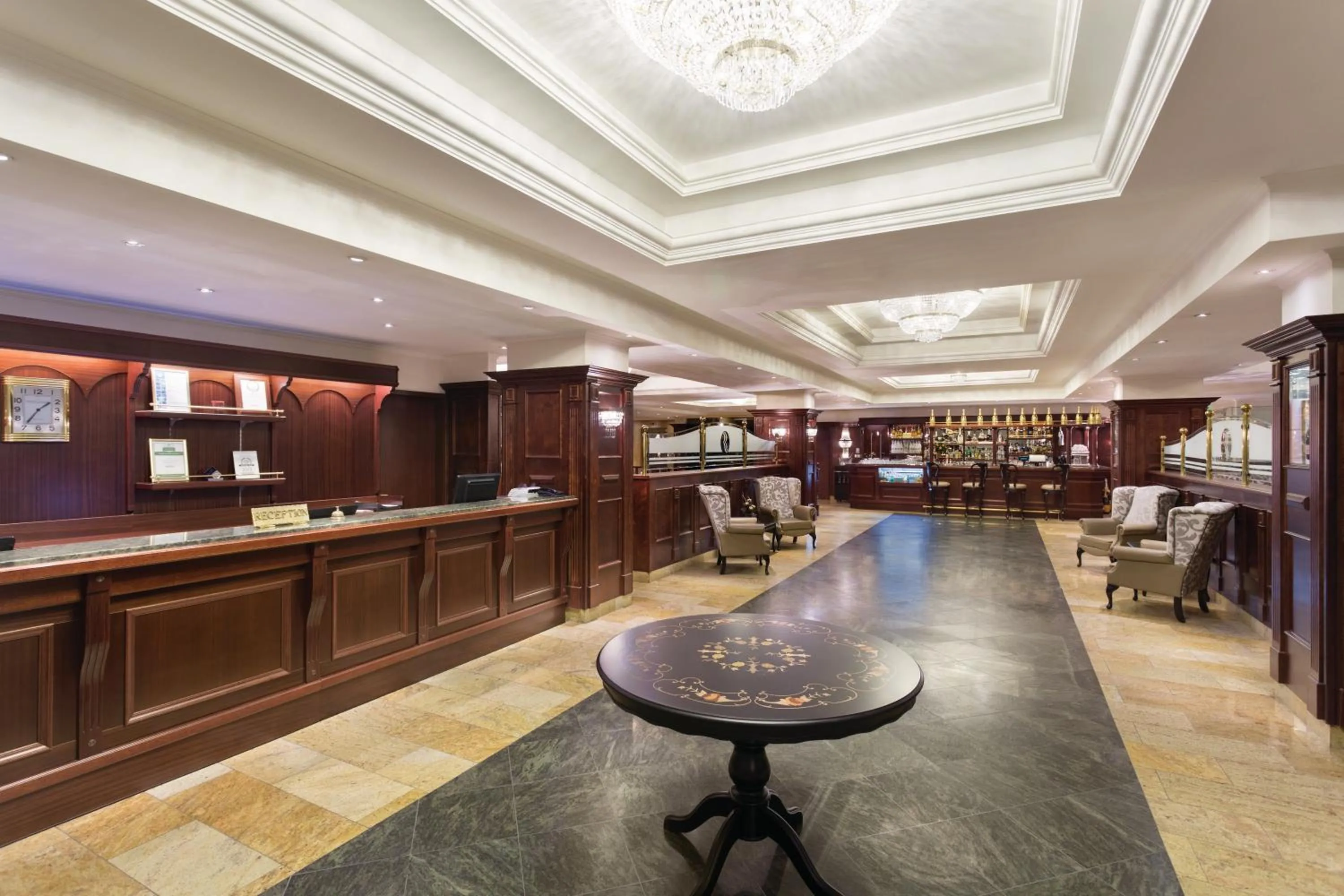 Lobby or reception in Ramada Hotel & Suites by Wyndham Bucharest North