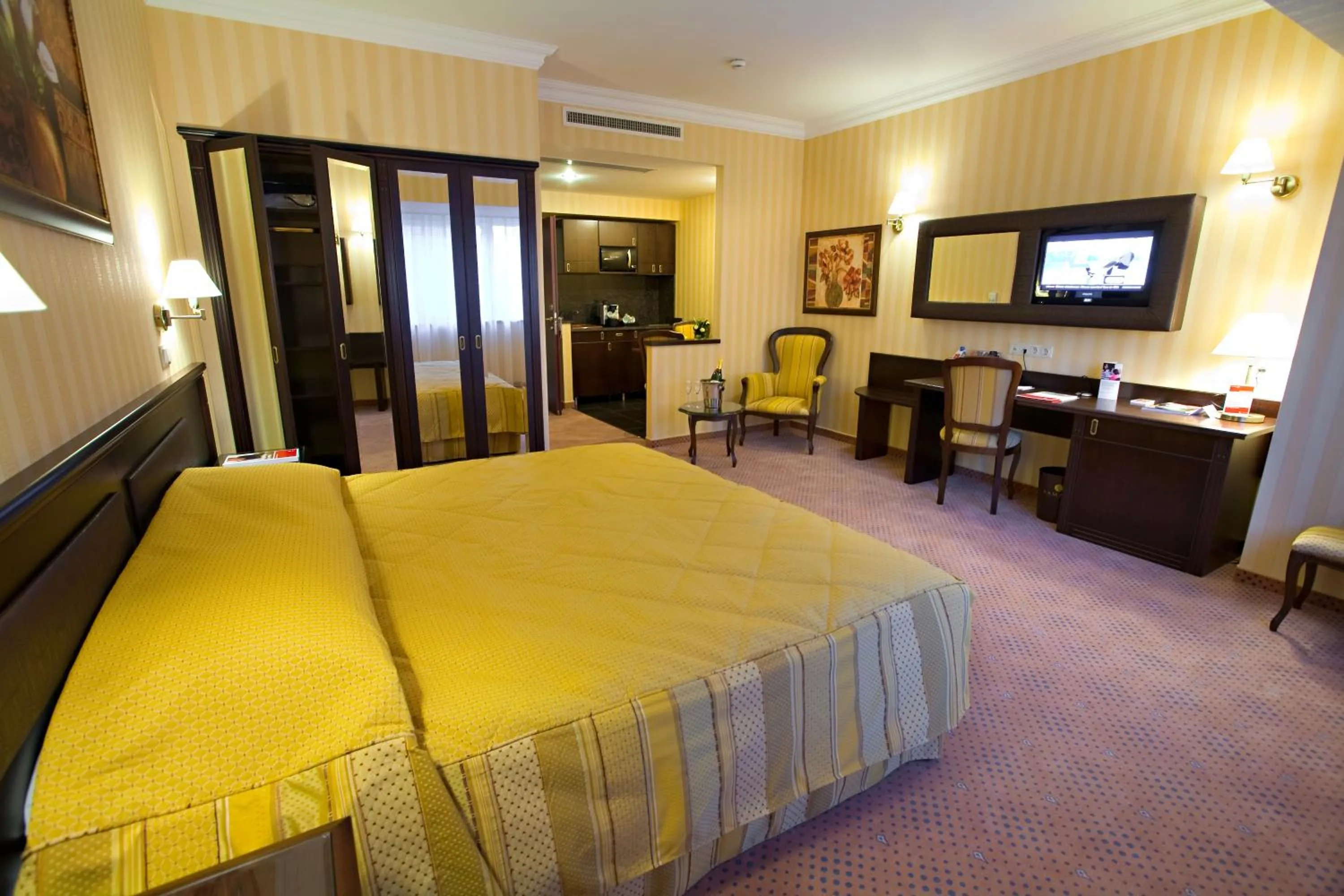 Bed in Ramada Hotel & Suites by Wyndham Bucharest North
