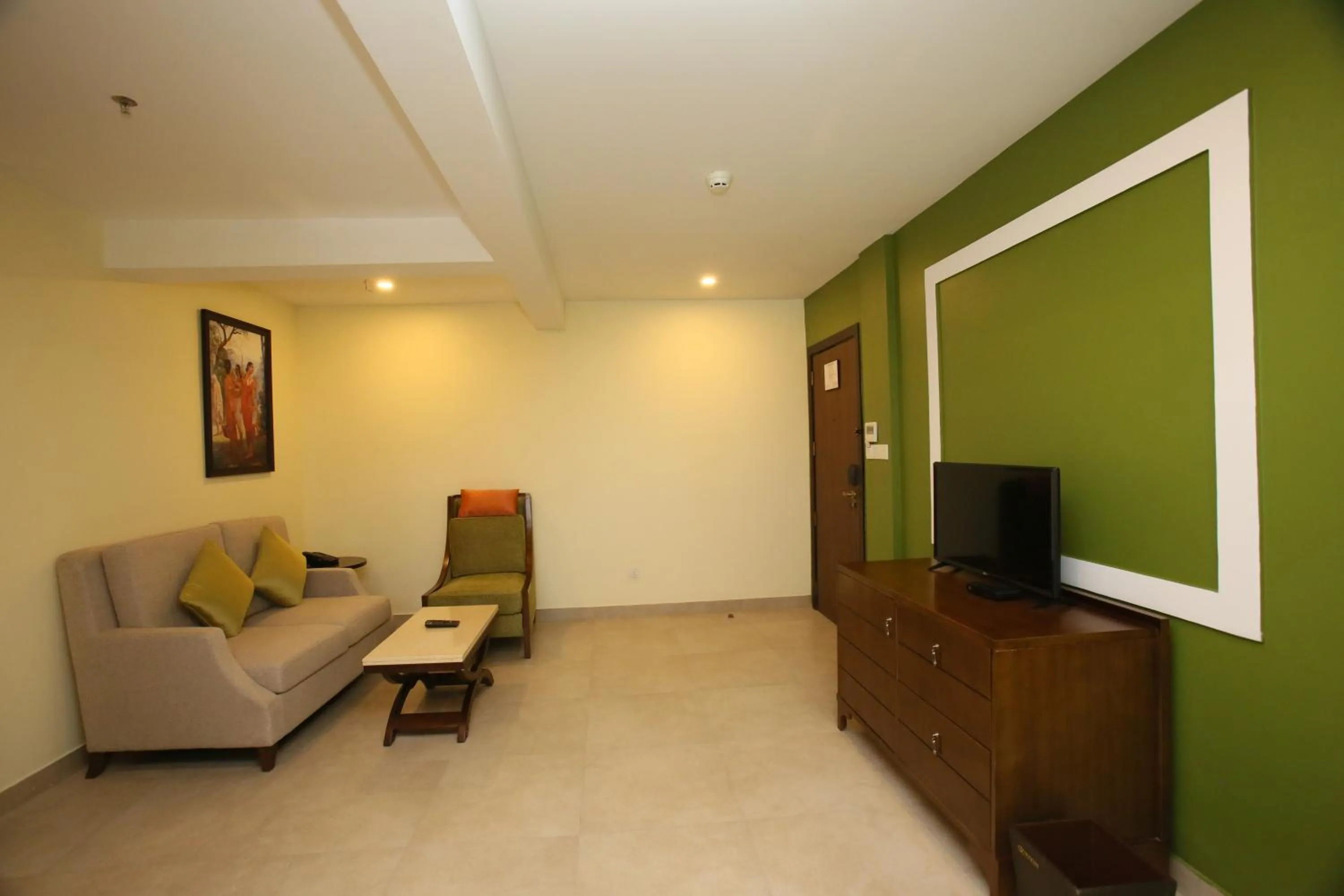 Communal lounge/ TV room in Vivin Luxury Suites