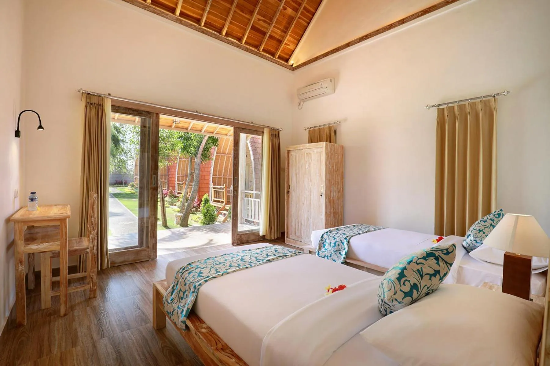 Bed in Bukal Sari Villas Uluwatu