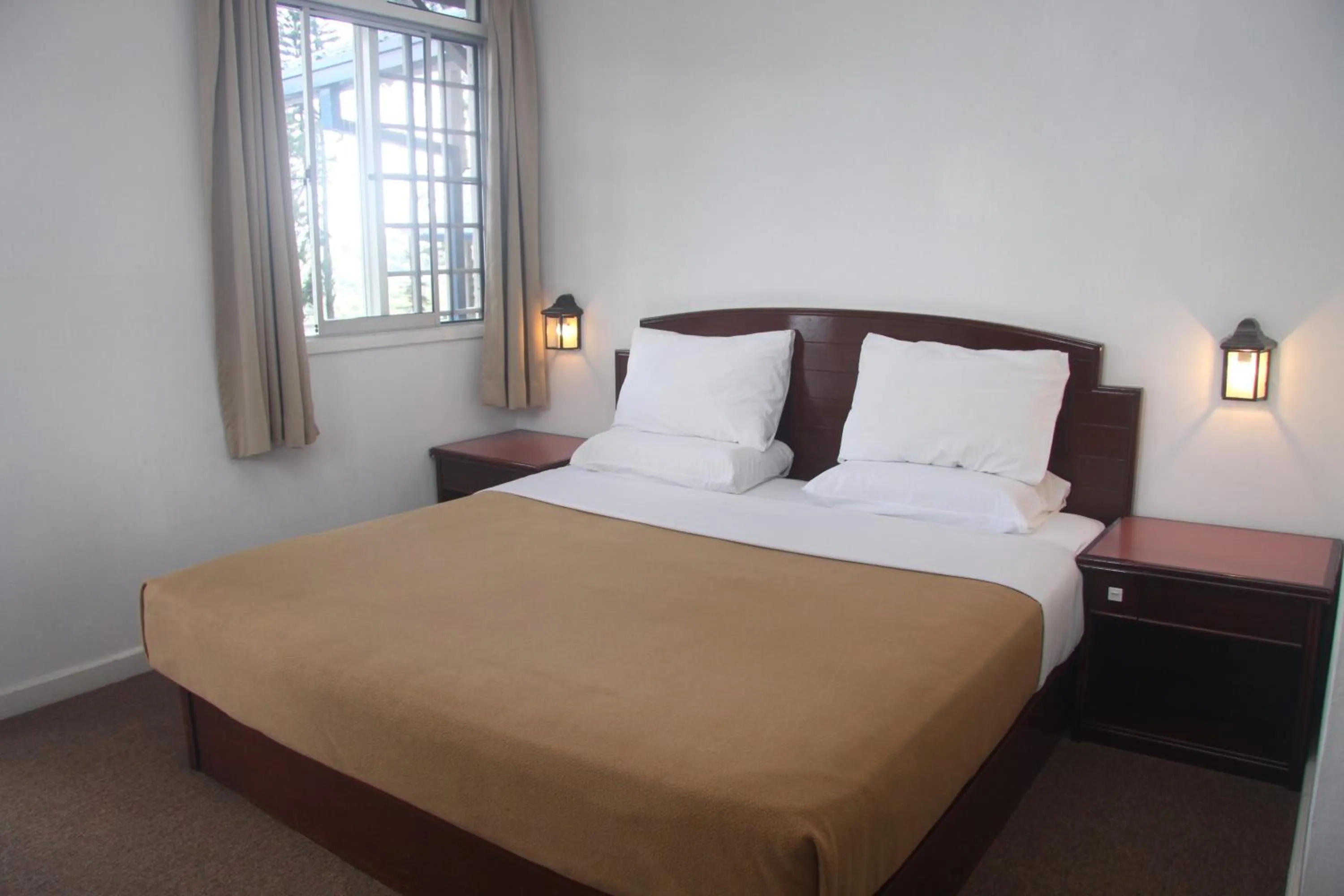 Bed in Kinabalu Pine Resort