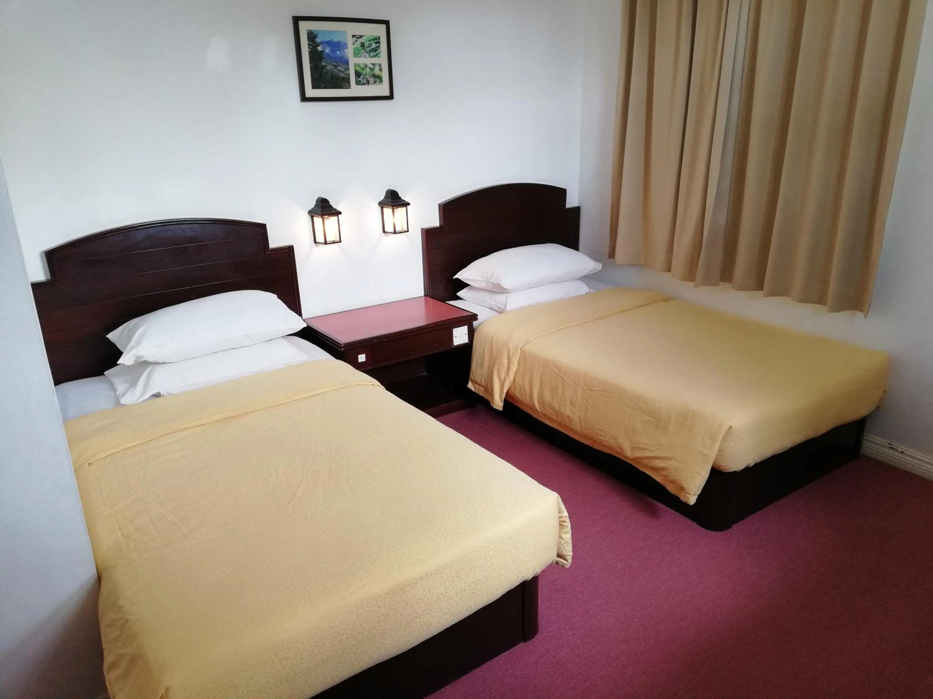 Bed in Kinabalu Pine Resort