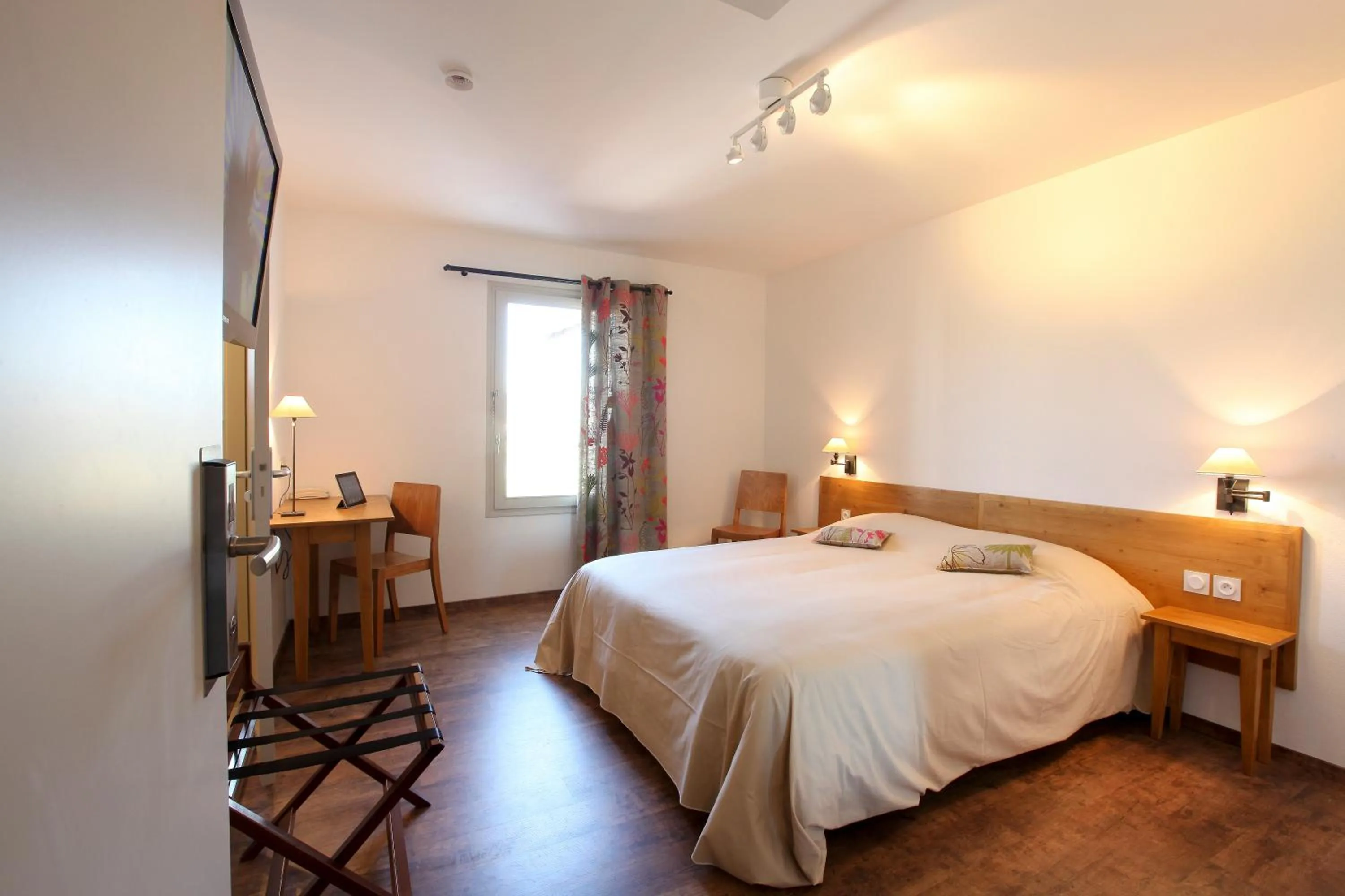 Photo of the whole room, Bed in Logis Hotel Le Nouvel