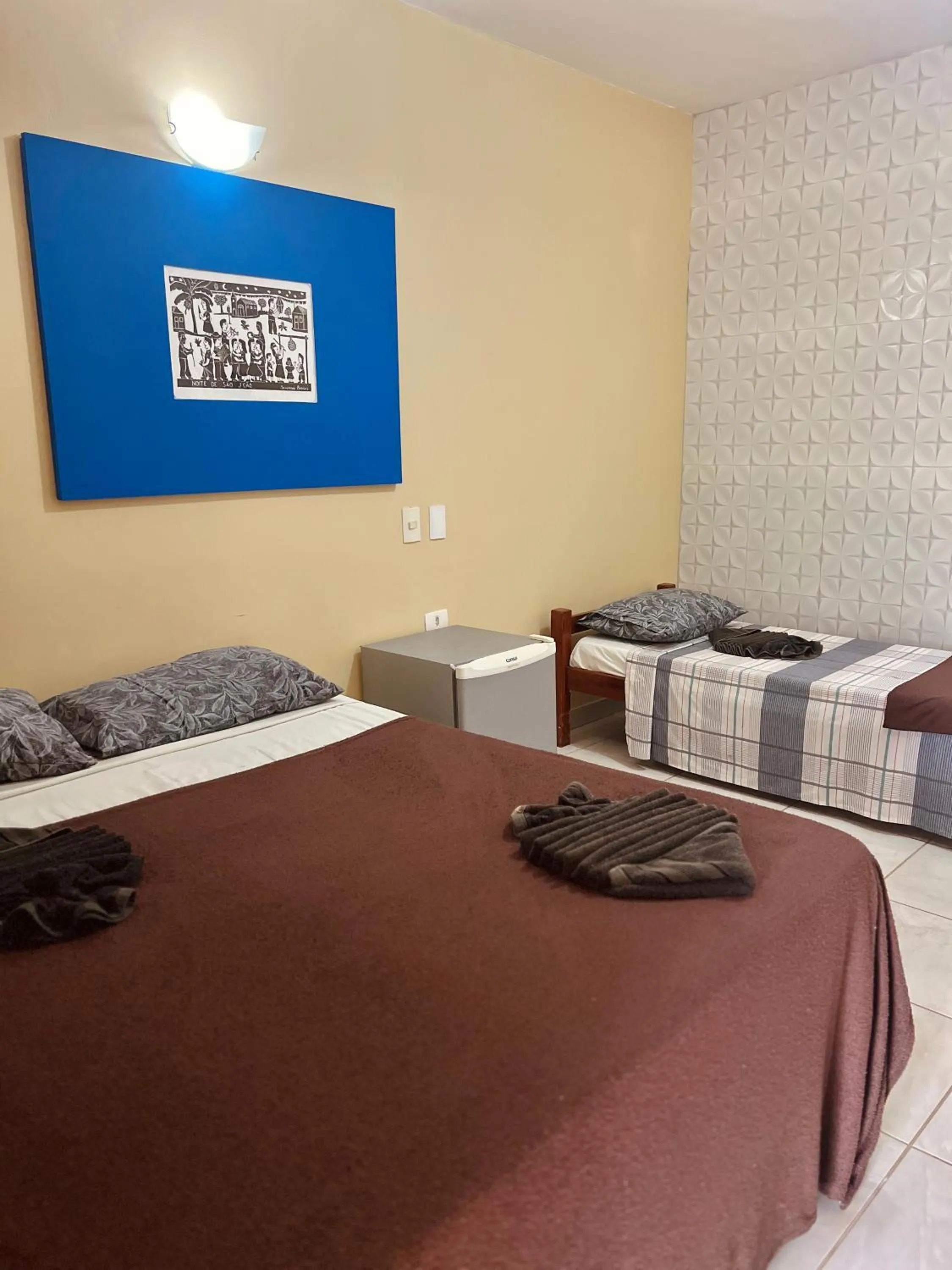 Bed in Pousada Costa Tropical