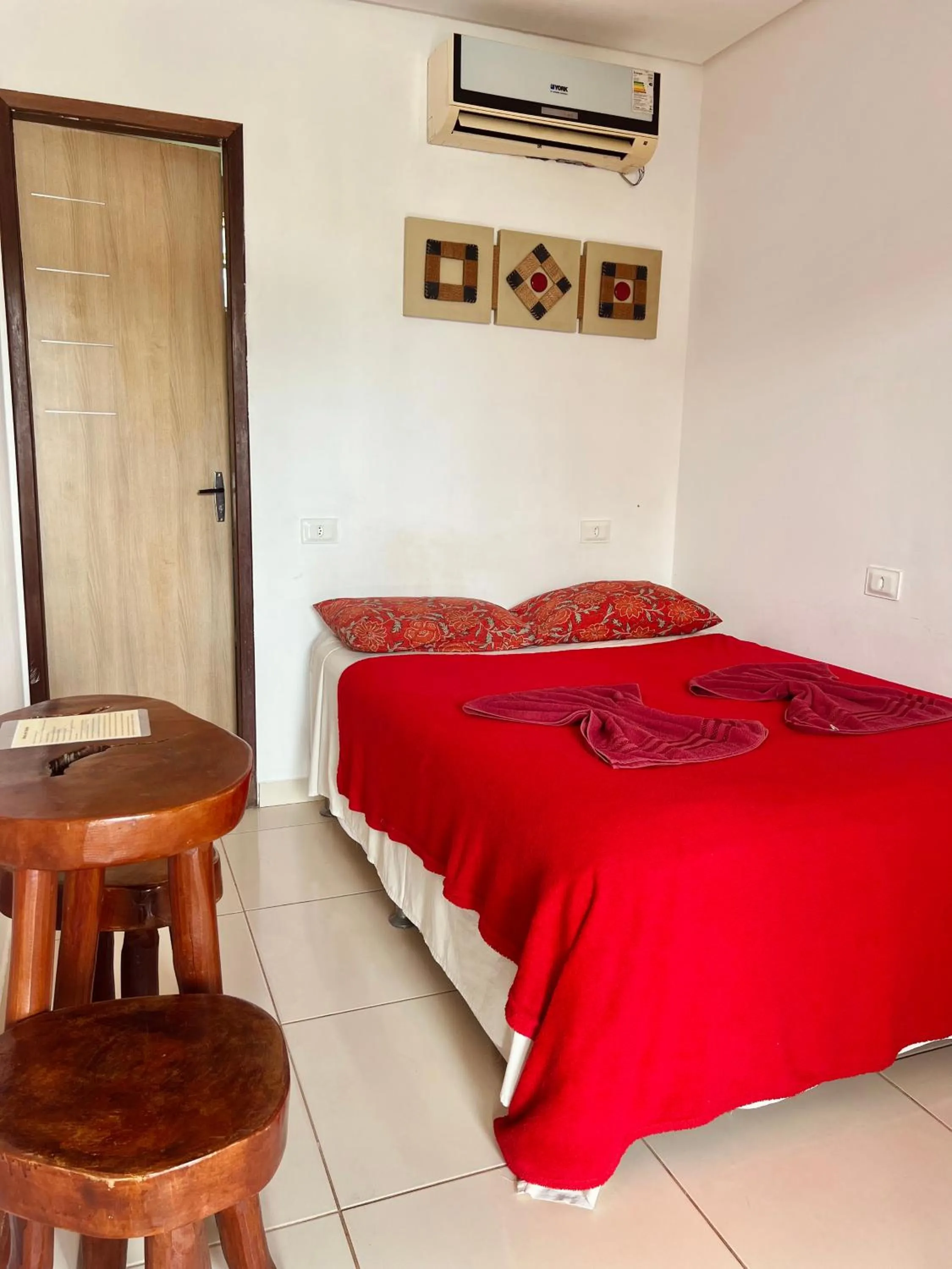 Bed in Pousada Costa Tropical