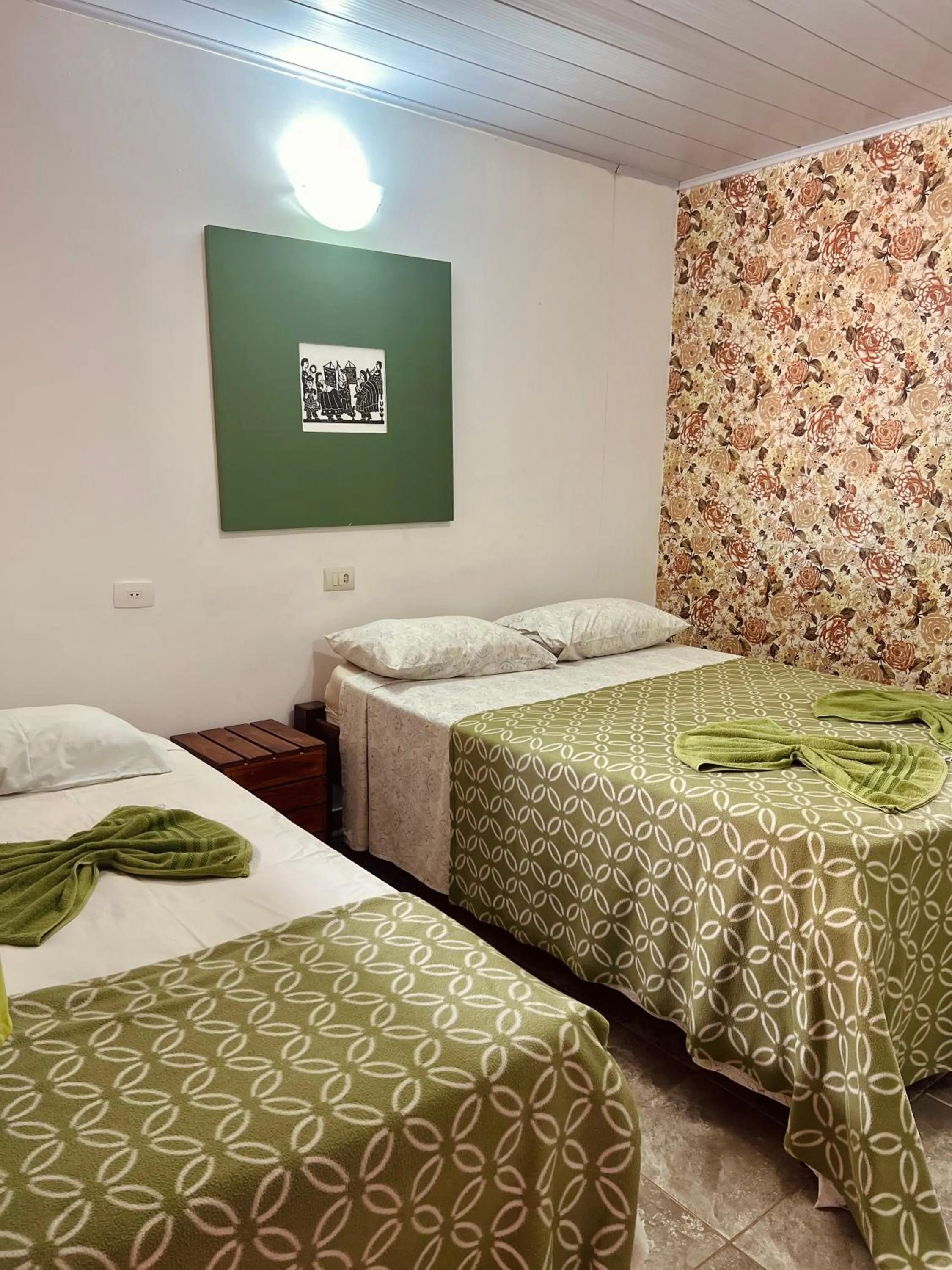 Bed in Pousada Costa Tropical