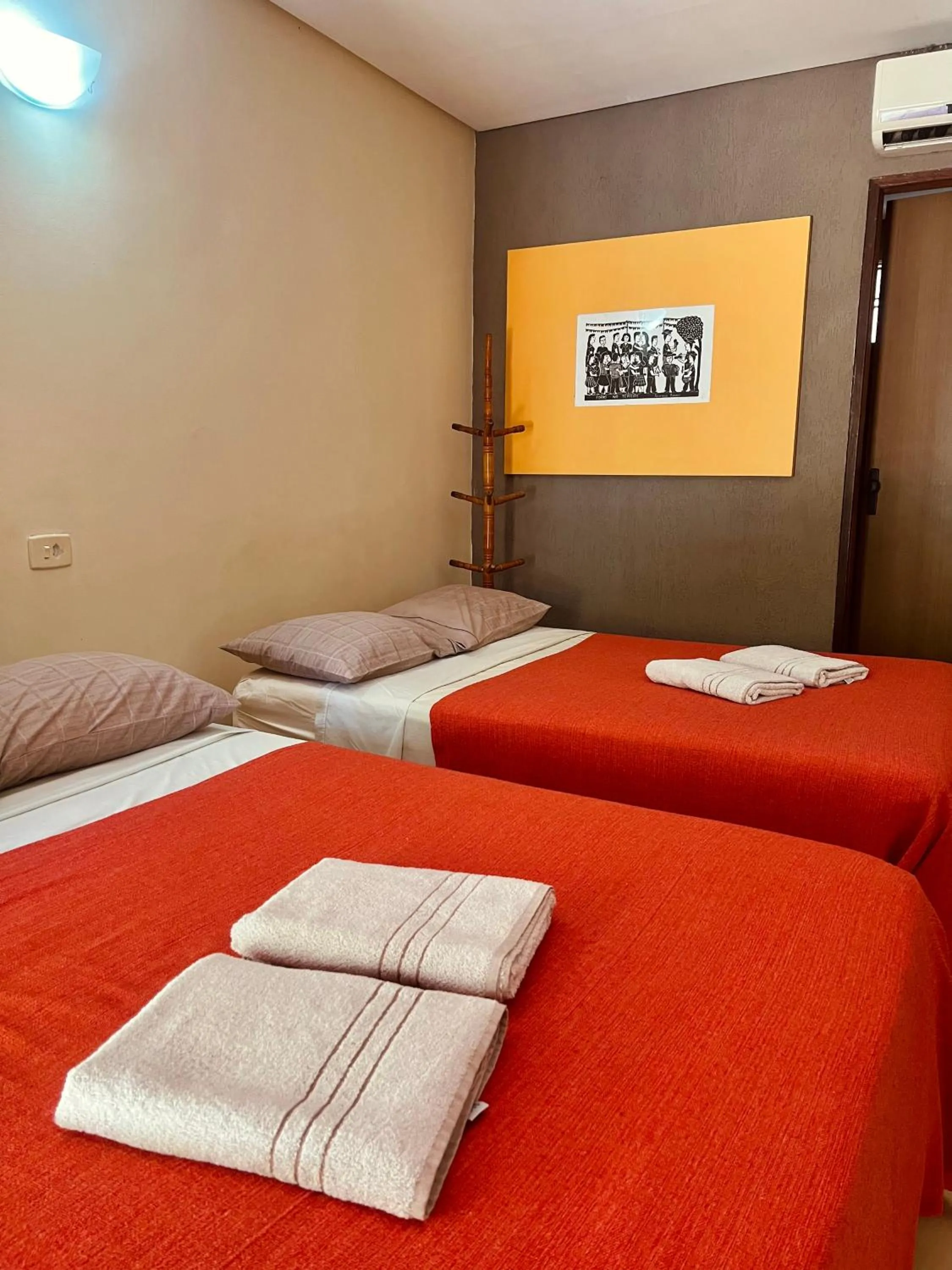 Bed in Pousada Costa Tropical