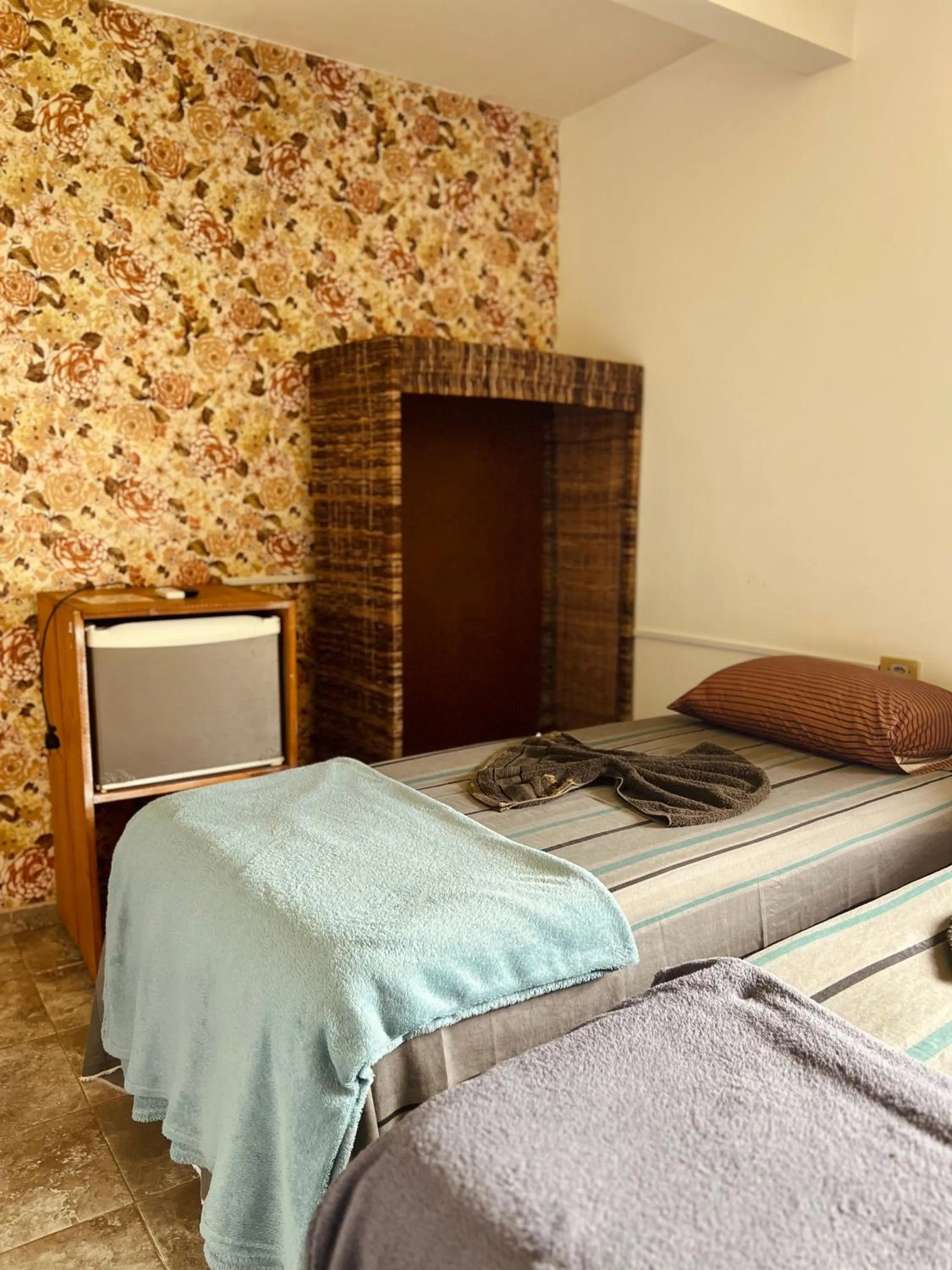 Bed in Pousada Costa Tropical