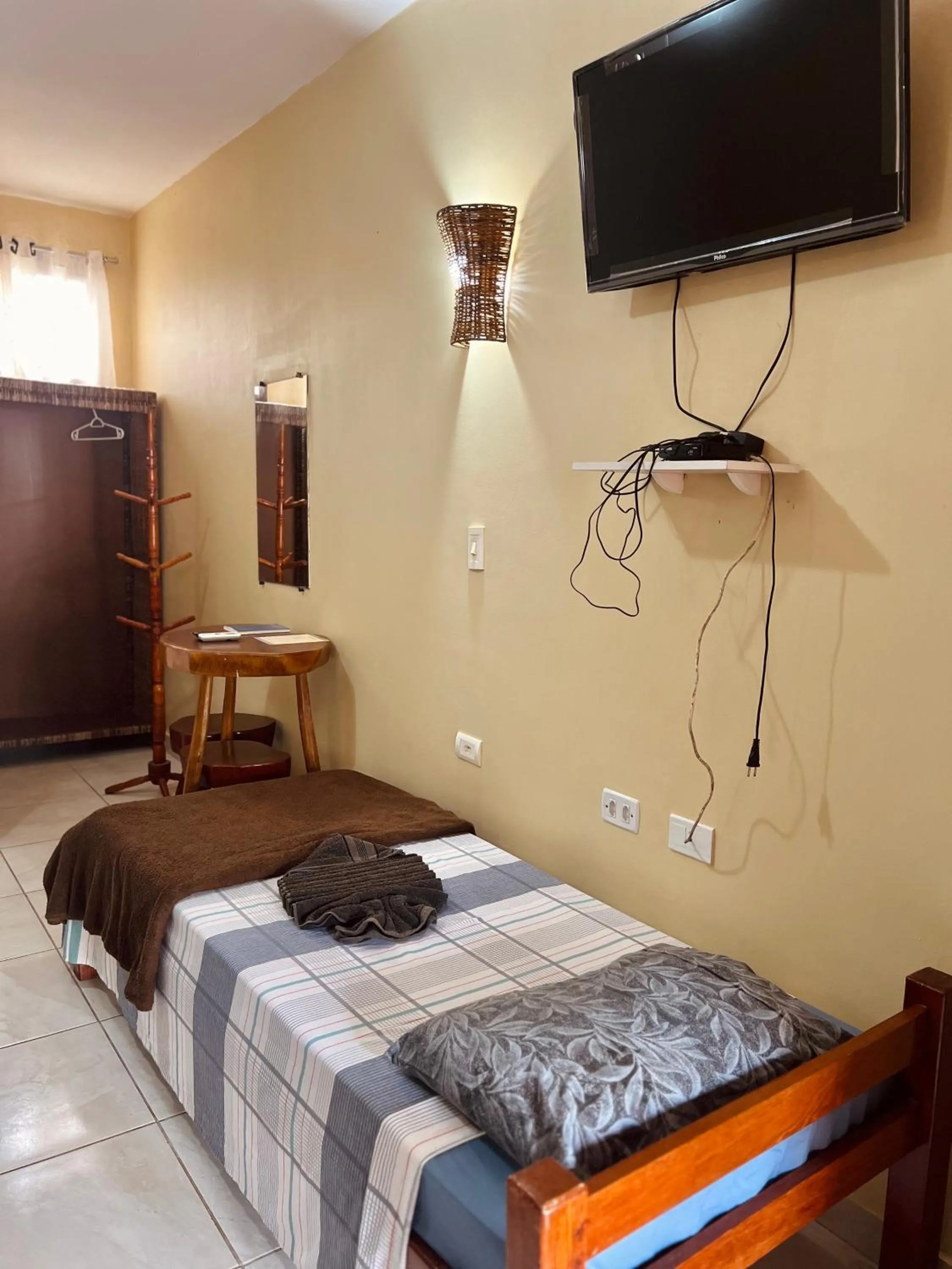 Bed in Pousada Costa Tropical