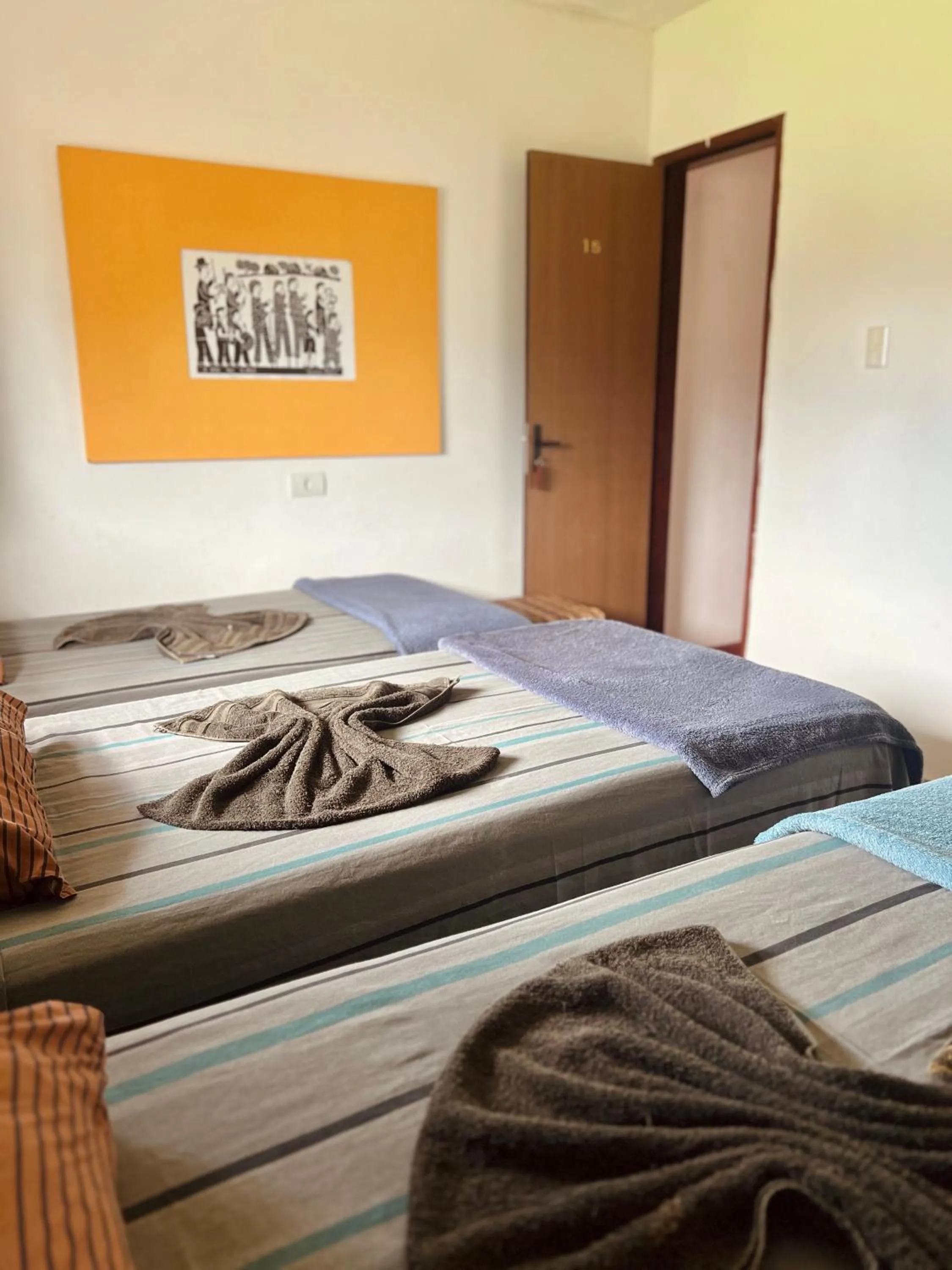 Bed in Pousada Costa Tropical