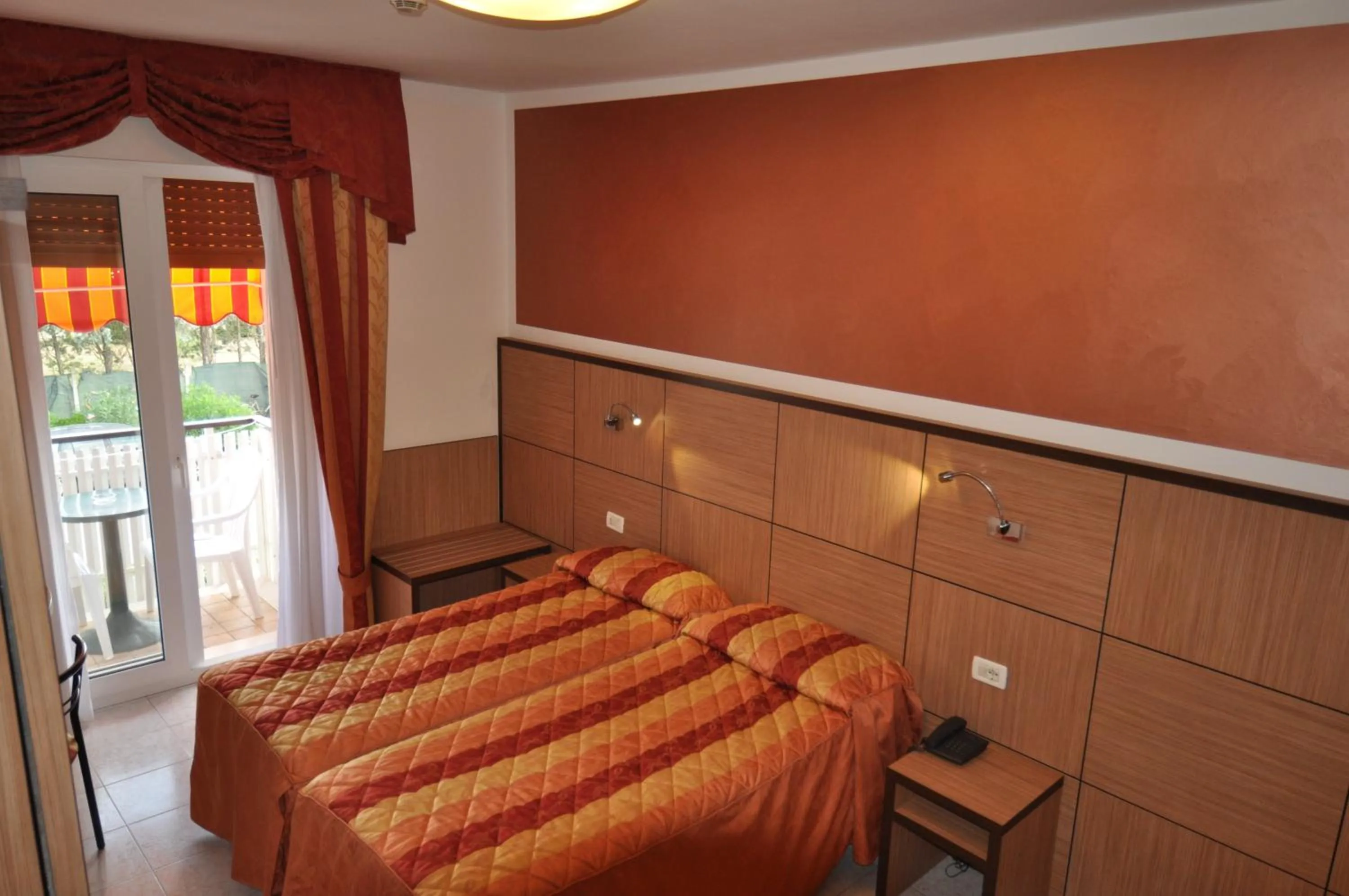 Bed in Hotel Righetto Fronte Mare