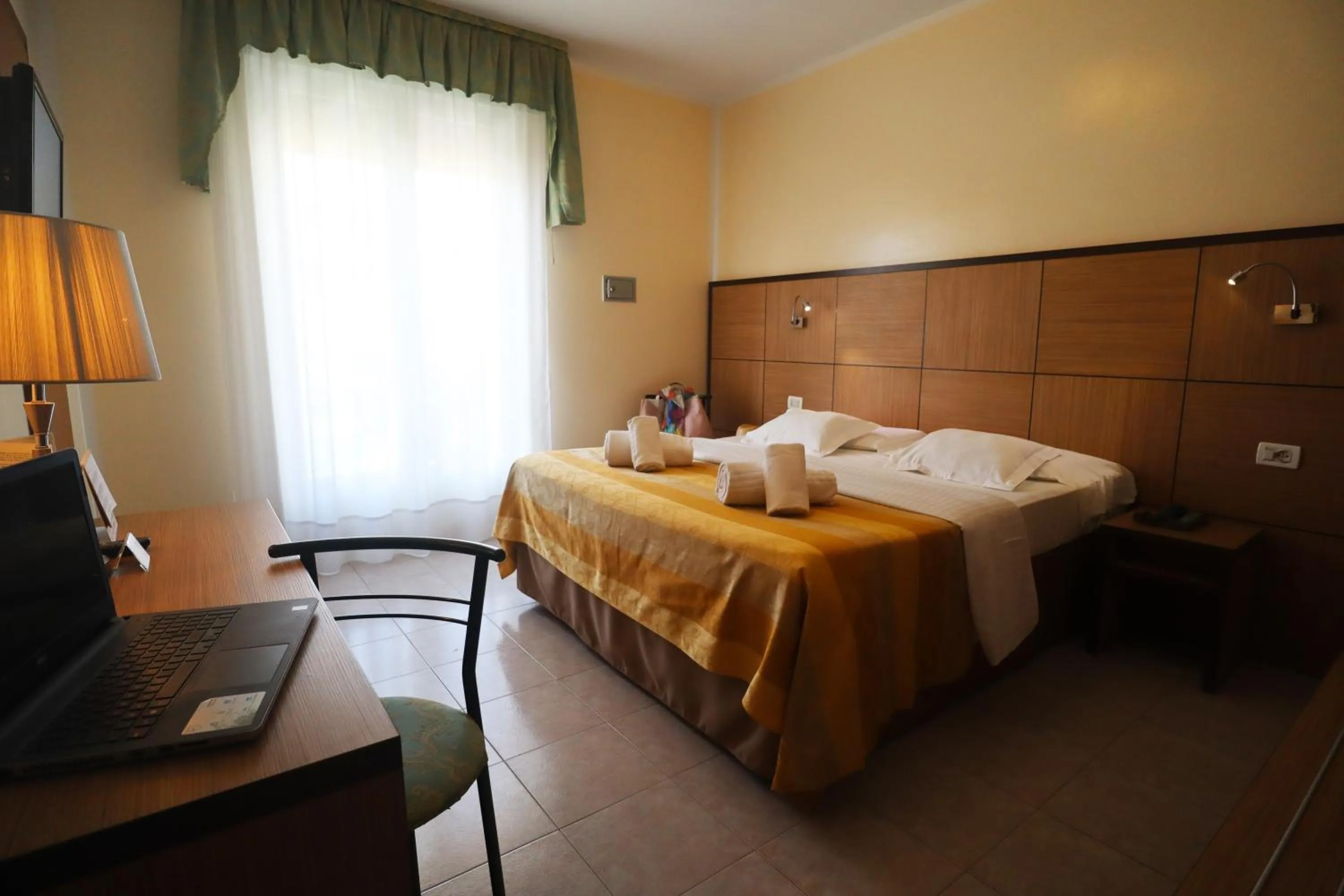 Bed in Hotel Righetto Fronte Mare