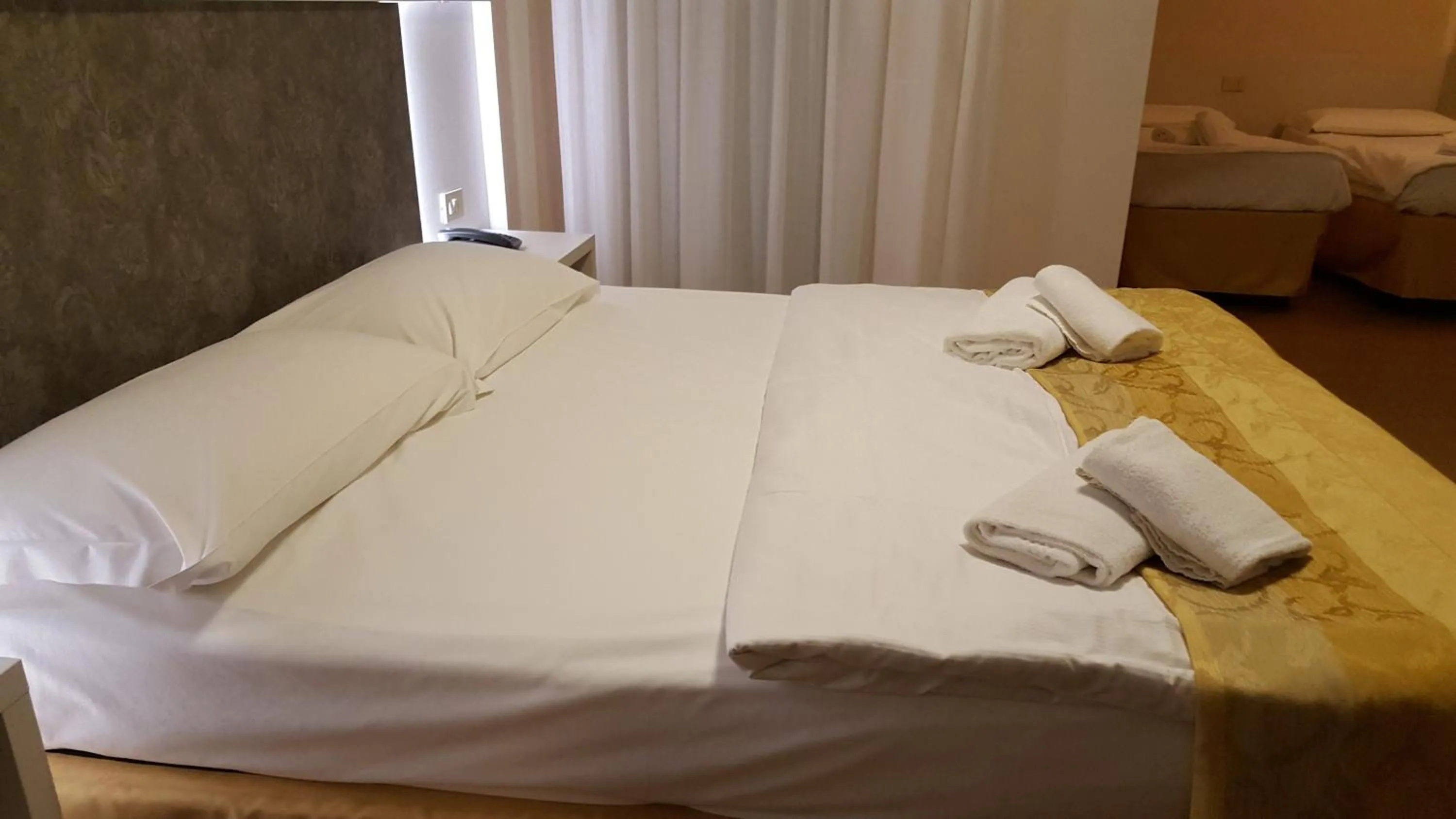 Bed in Hotel Righetto Fronte Mare