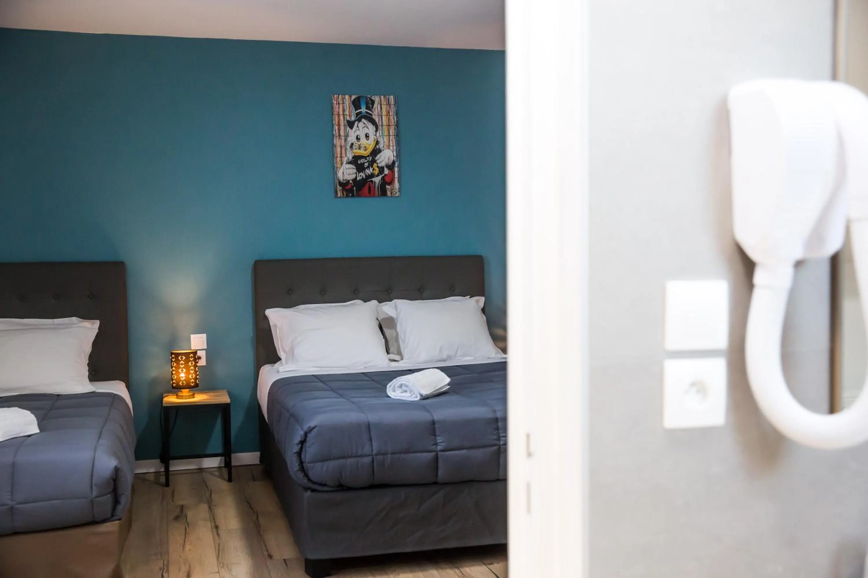 Bedroom, Bed in Hôtel Les Pieux En Cotentin