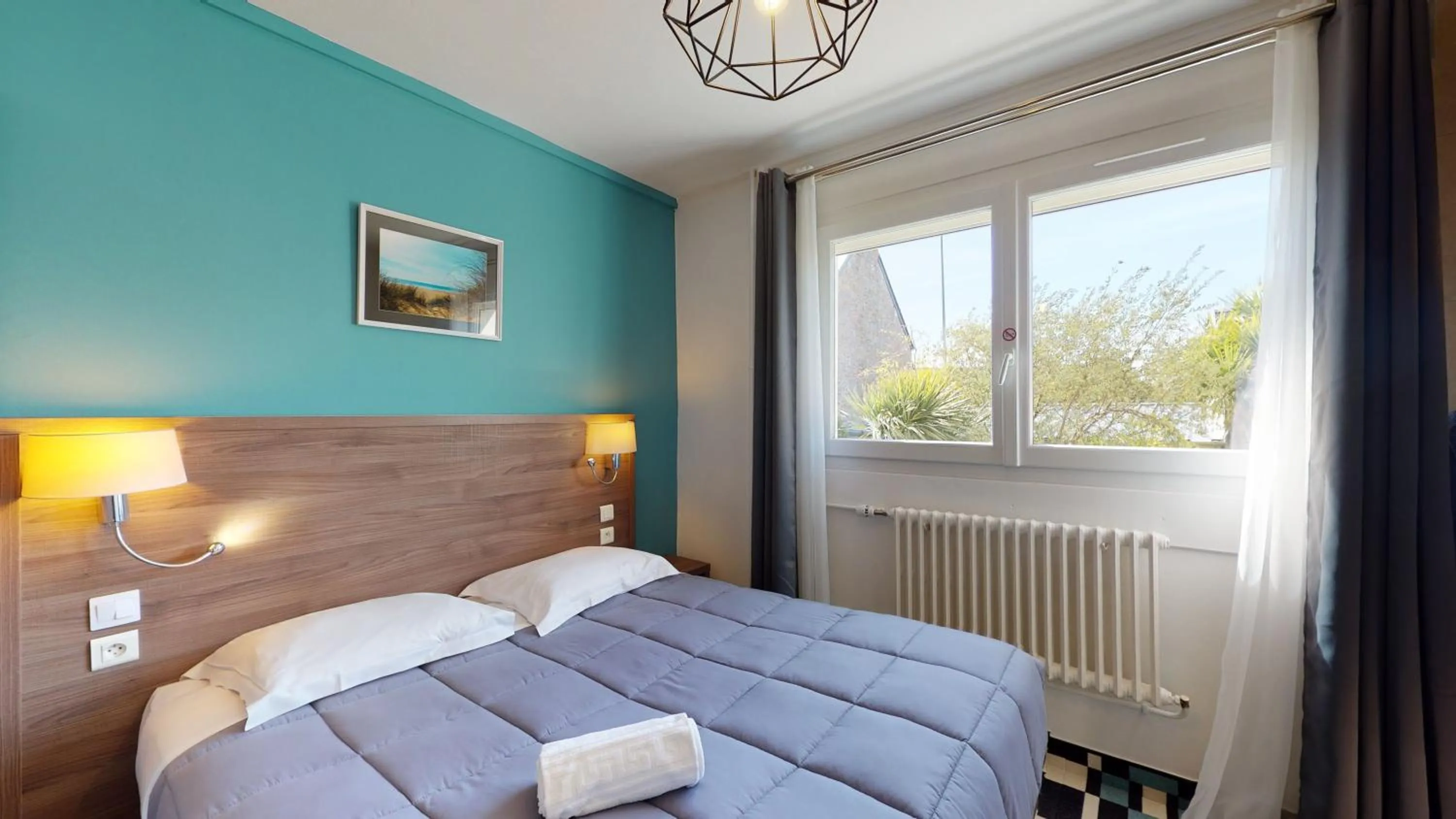 Bed in Hôtel Les Pieux En Cotentin