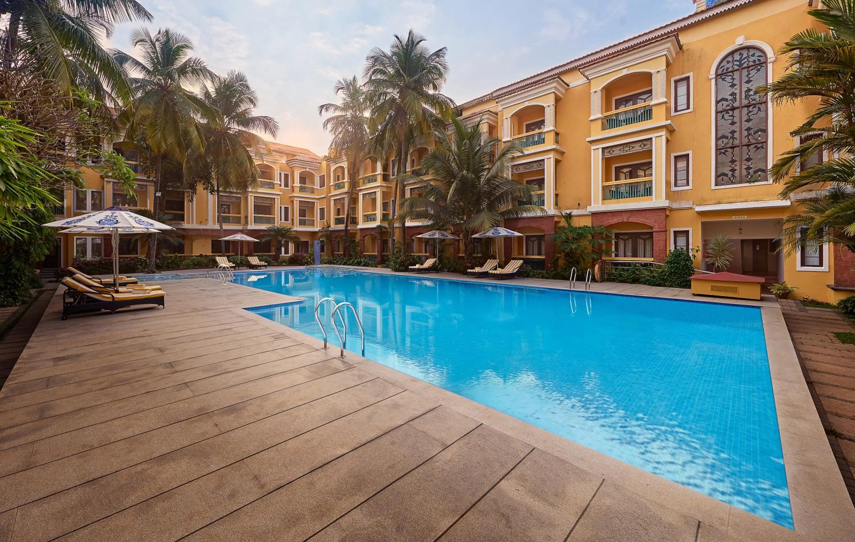 Swimming pool in Country Inn & Suites by Radisson, Goa Candolim