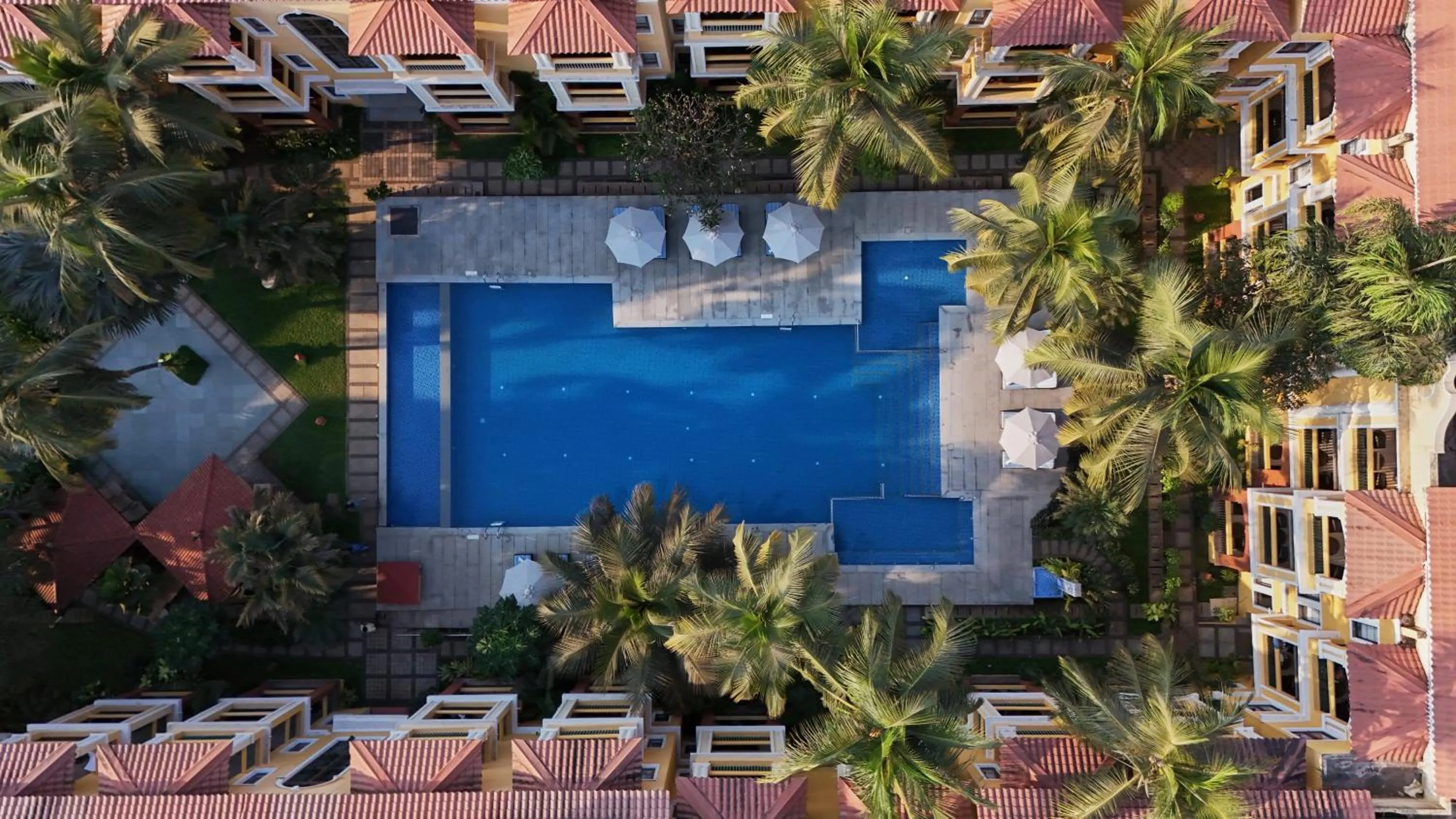 Swimming pool in La Estoria, Goa - IHCL SeleQtions