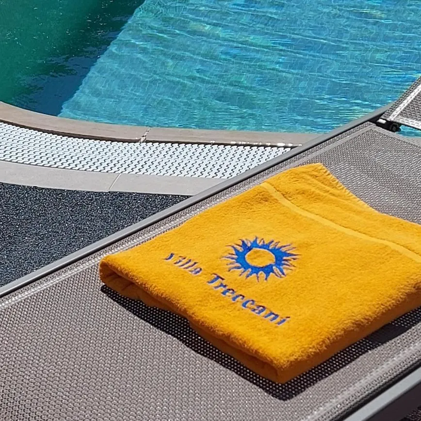 Property logo or sign in Villa Treccani Apartments