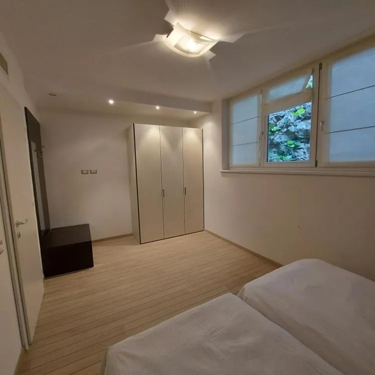 Bed in Villa Treccani Apartments