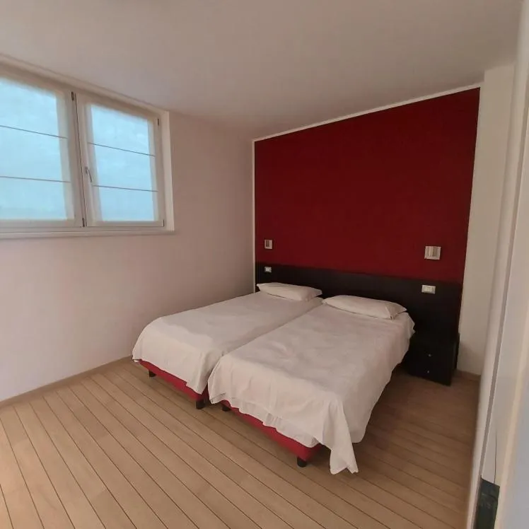 Bed in Villa Treccani Apartments