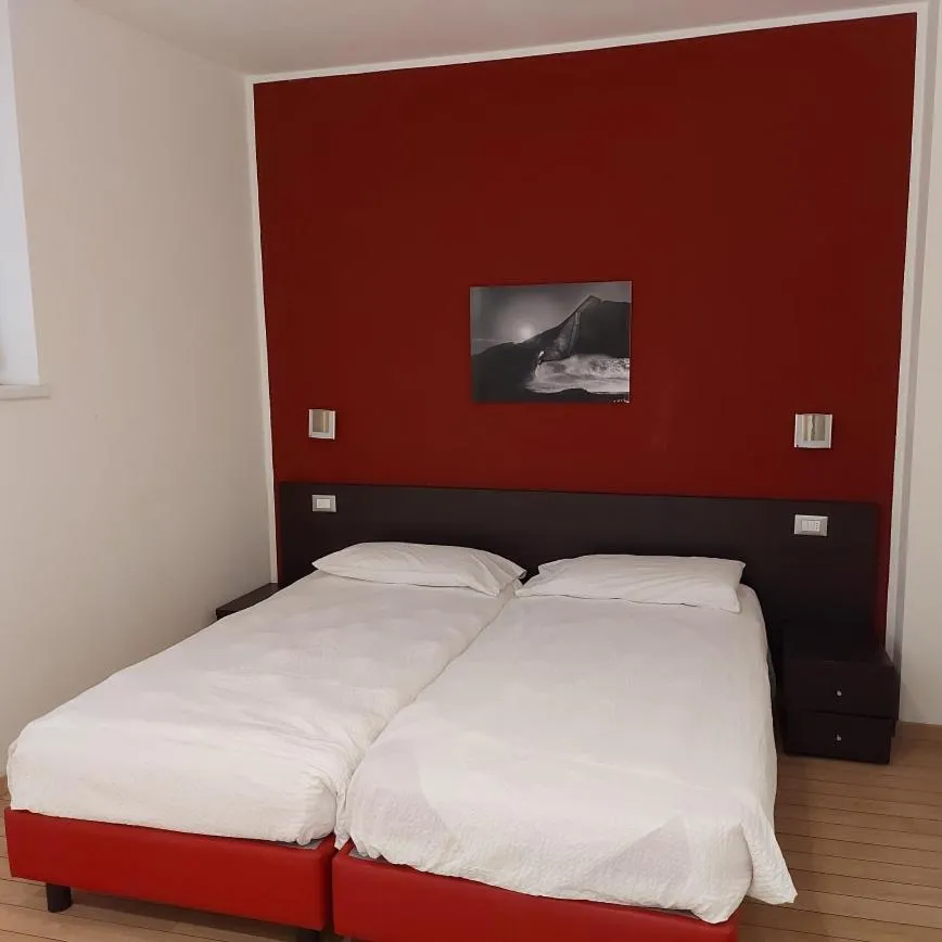 Bed in Villa Treccani Apartments