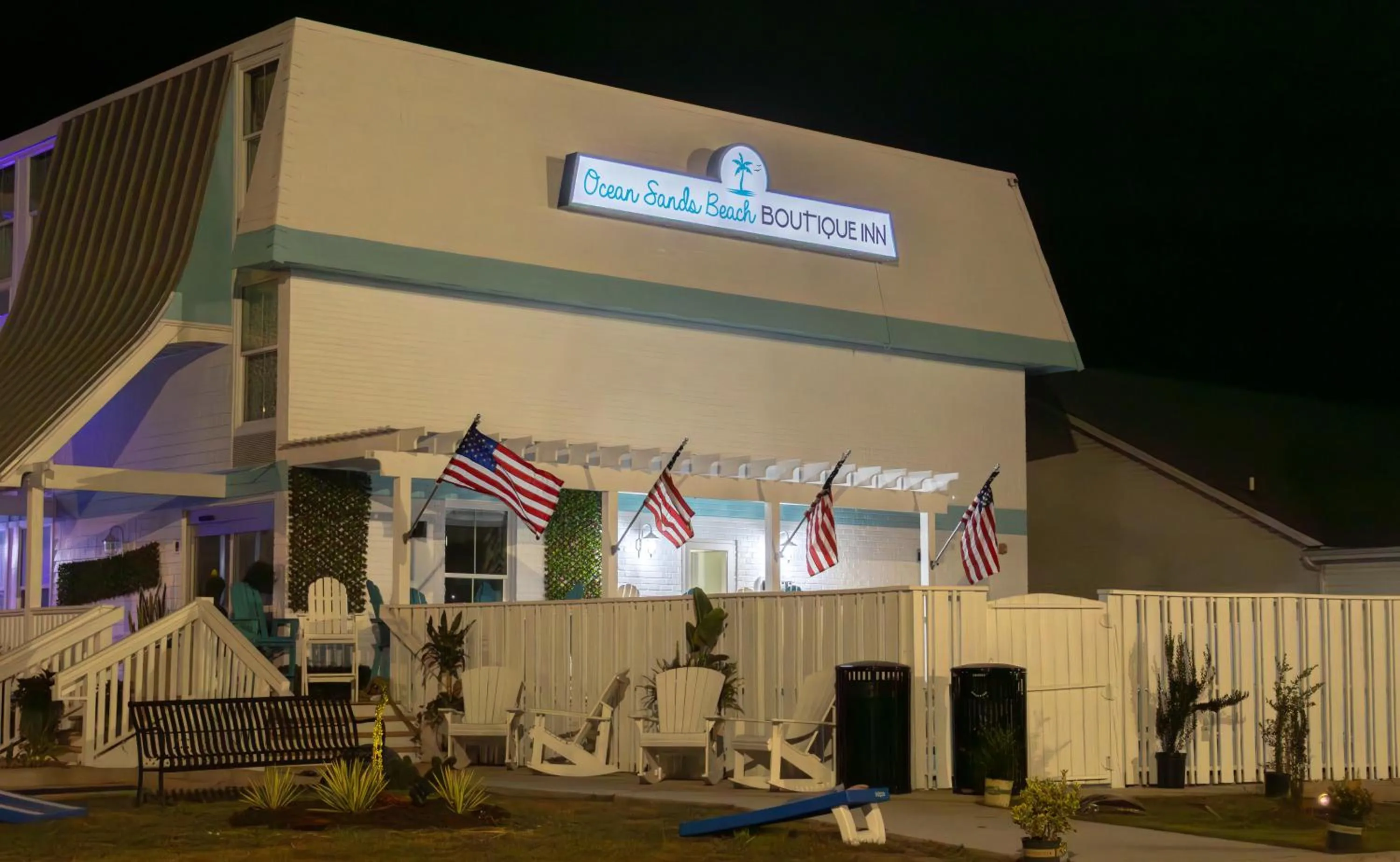 Property building in NEW 2026-Ocean Sands Beach Boutique Inn-Sauna and Salt-Mineral Pool -Free Beach Bikes and Famous Beach- Fresh Baked Cookies and Popcorn - Bathrobes and Sunscreen in all rooms-Ultra Sparkling-Free Laundry- 4 Grand Black Beds-Call NOW & Save-1-252-AHA-SAND