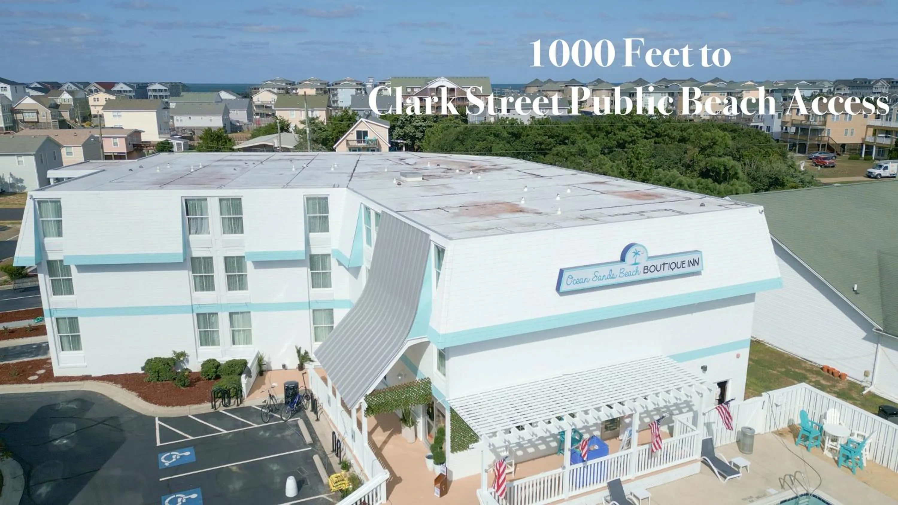 NEW 2026-Ocean Sands Beach Boutique Inn-Sauna and Salt-Mineral Pool -Free Beach Bikes and Famous Beach- Fresh Baked Cookies and Popcorn - Bathrobes and Sunscreen in all rooms-Ultra Sparkling-Free Laundry- 4 Grand Black Beds-Call NOW & Save-1-252-AHA-SAND