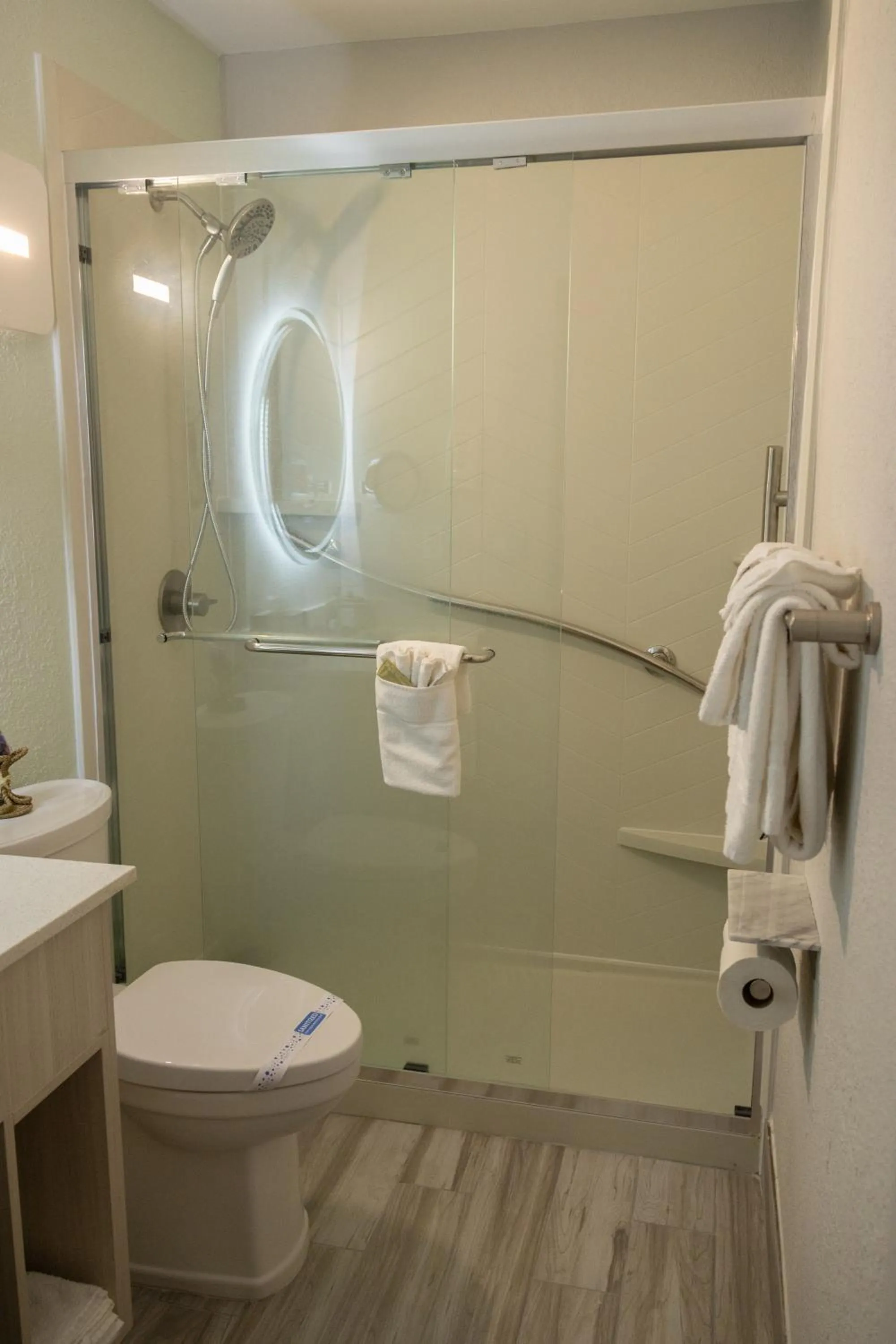 Bathroom in NEW 2026-Ocean Sands Beach Boutique Inn-Sauna and Salt-Mineral Pool -Free Beach Bikes and Famous Beach- Fresh Baked Cookies and Popcorn - Bathrobes and Sunscreen in all rooms-Ultra Sparkling-Free Laundry- 4 Grand Black Beds-Call NOW & Save-1-252-AHA-SAND