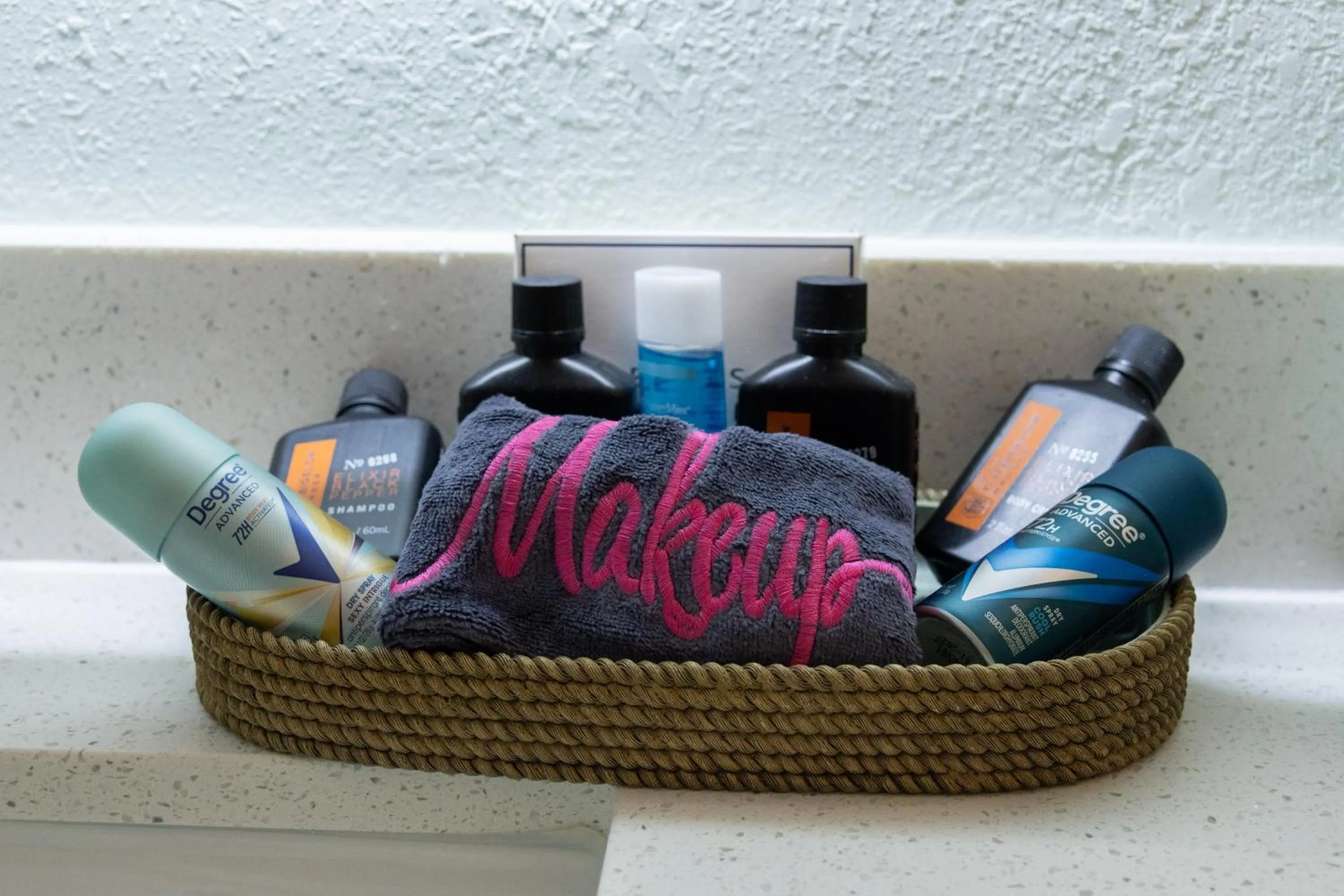 Bathroom in NEW 2026-Ocean Sands Beach Boutique Inn-Sauna and Salt-Mineral Pool -Free Beach Bikes and Famous Beach- Fresh Baked Cookies and Popcorn - Bathrobes and Sunscreen in all rooms-Ultra Sparkling-Free Laundry- 4 Grand Black Beds-Call NOW & Save-1-252-AHA-SAND