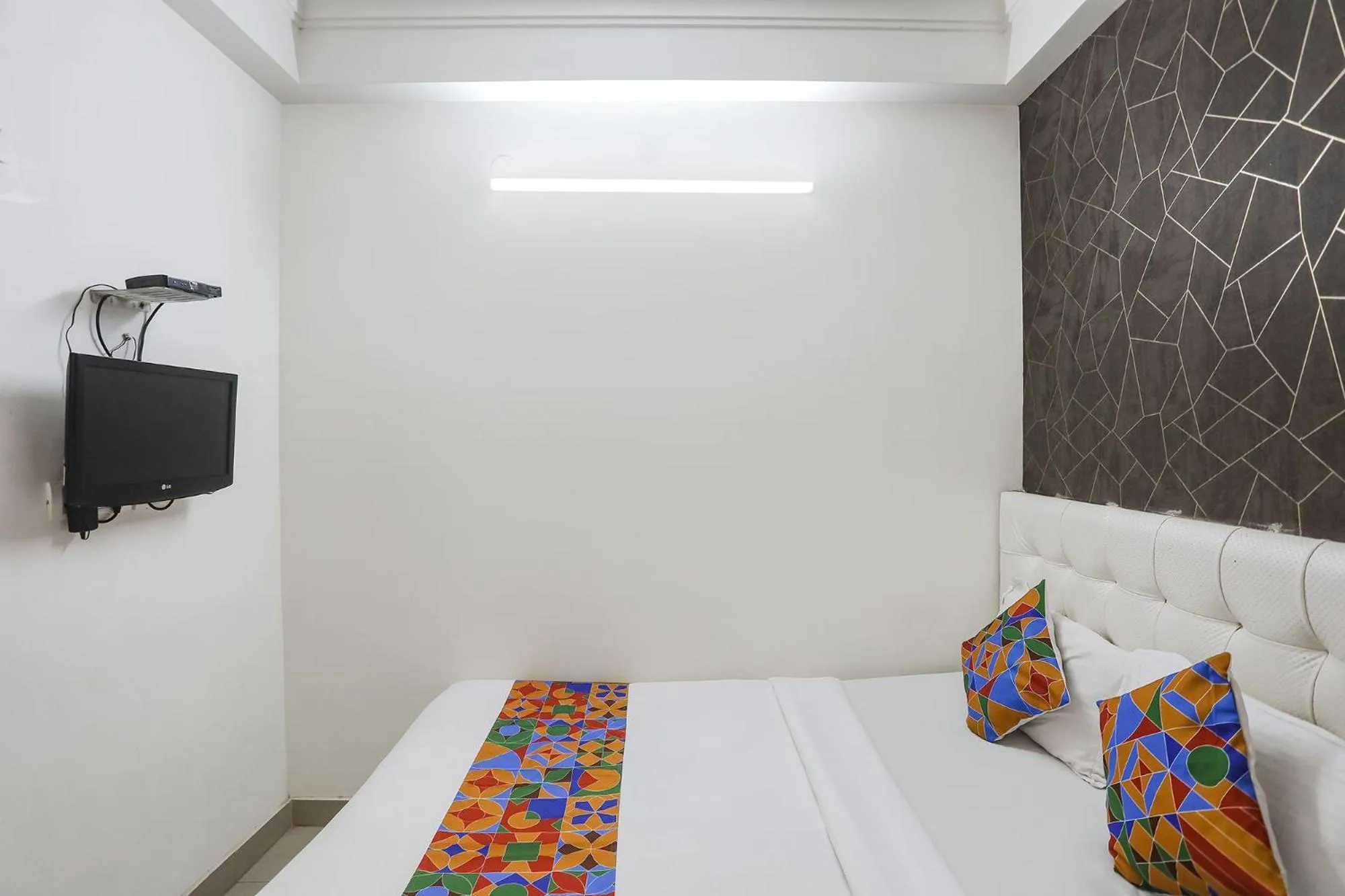 Bed in FabHotel Greenstar Inn - Bhubaneswar Airport
