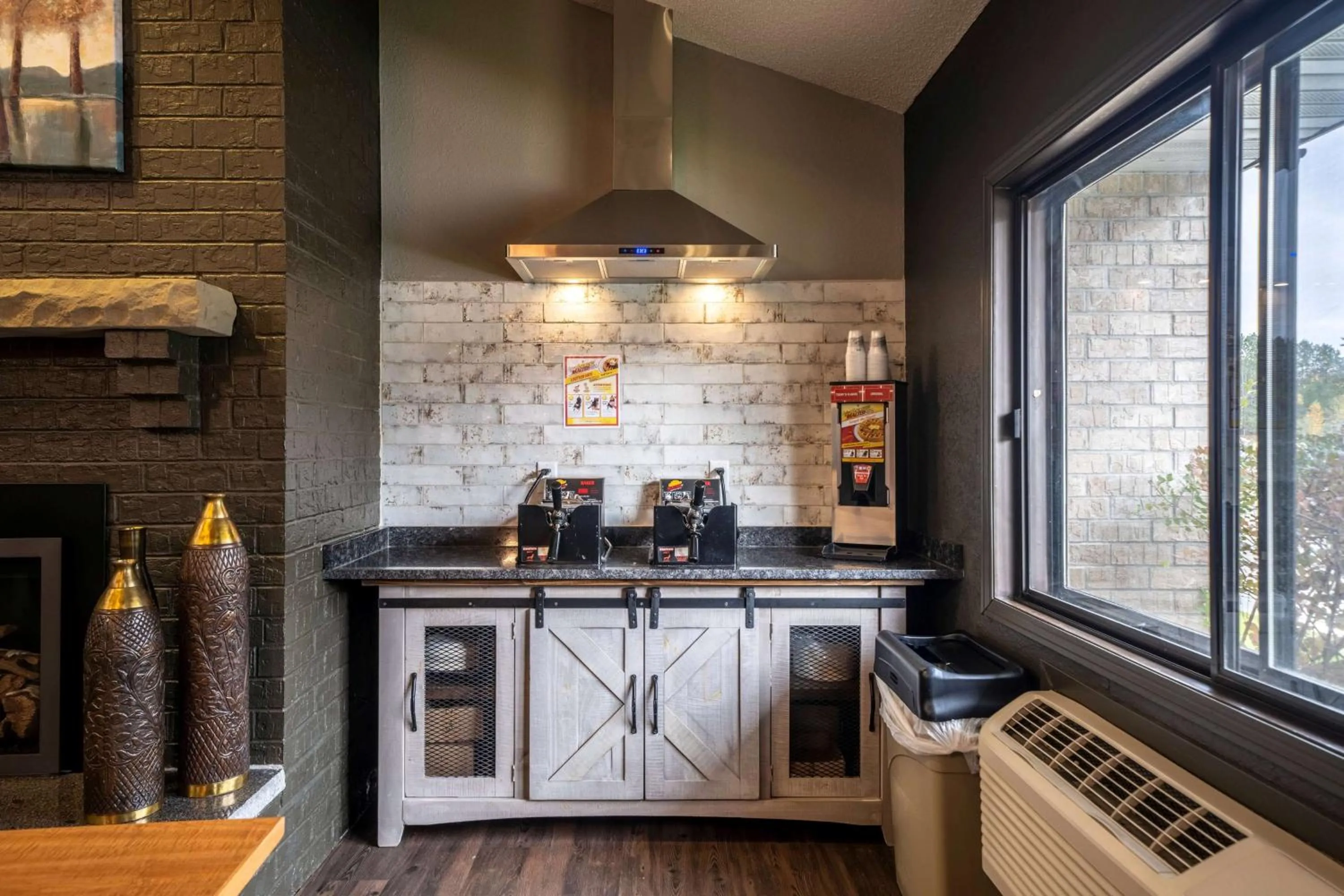 Lobby or reception in AmericInn by Wyndham Grand Rapids