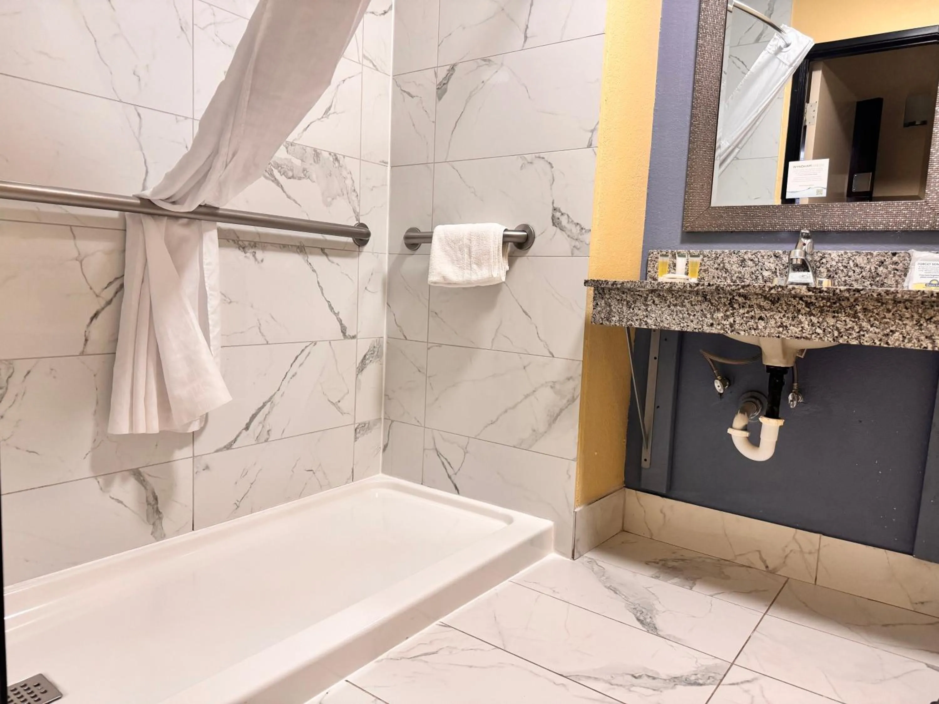 Bathroom in Days Inn by Wyndham Mauldin/Greenville