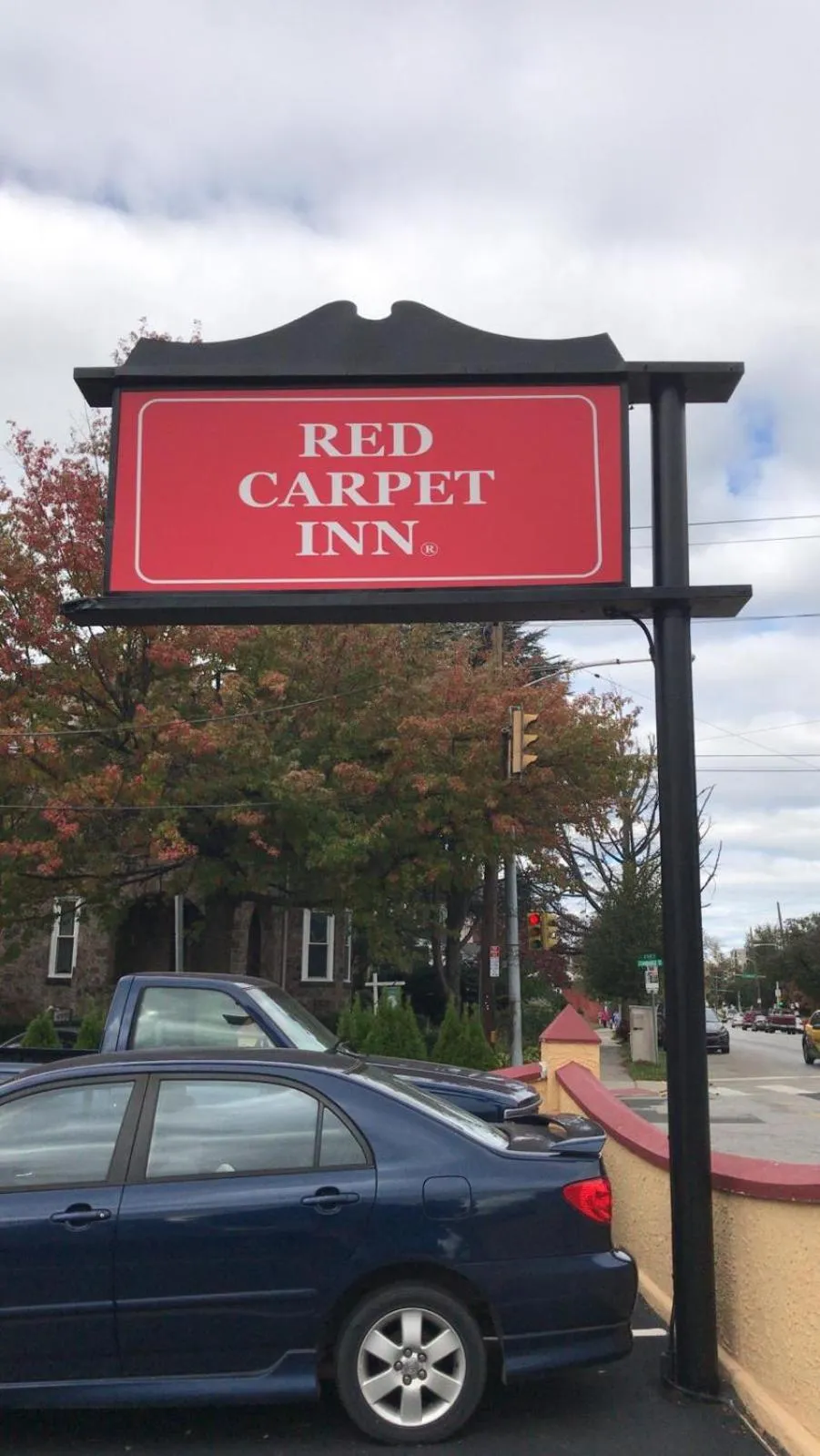 Property logo or sign in Red Carpet Inn - Norristown