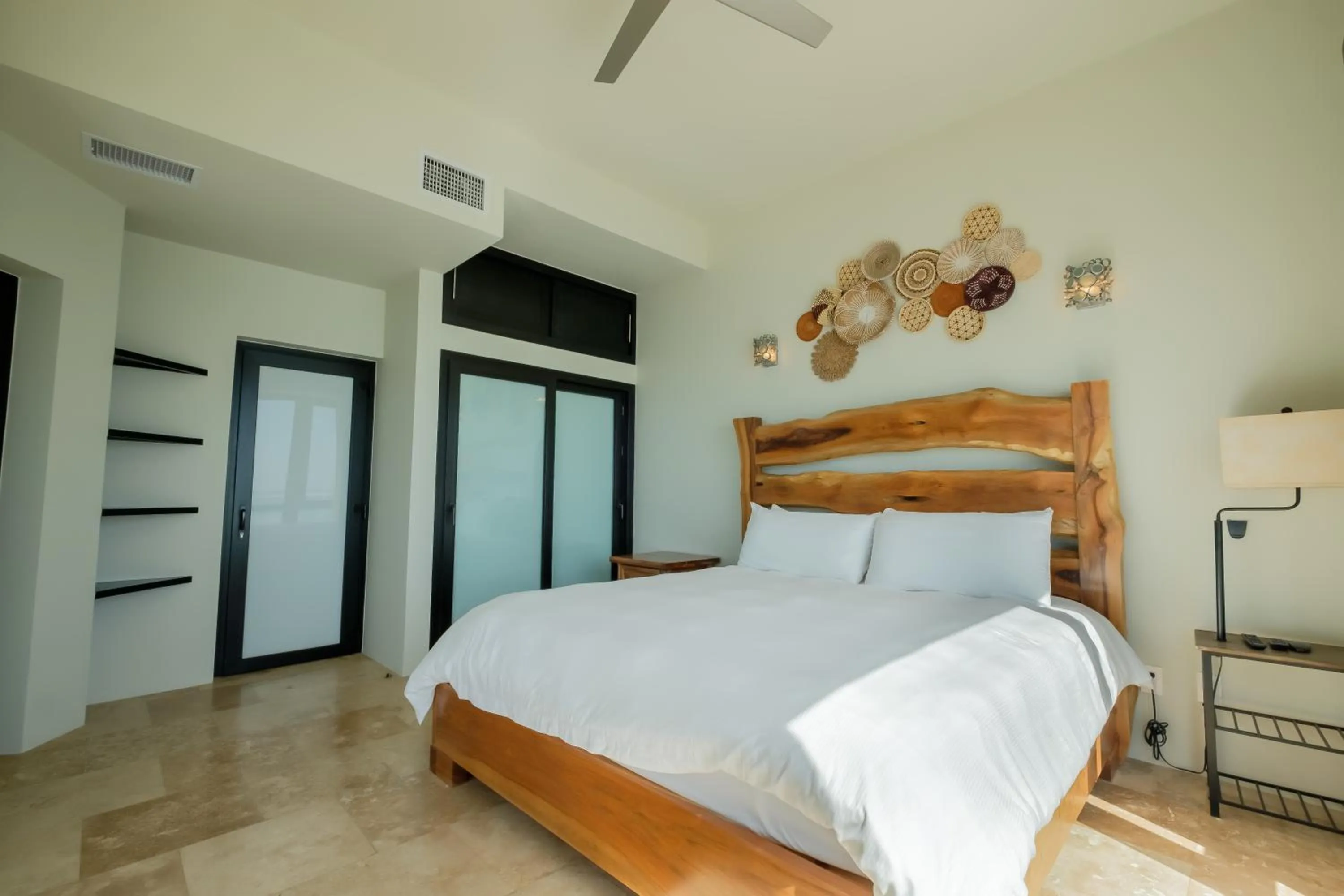 Bed in Diamante Beachfront Suites
