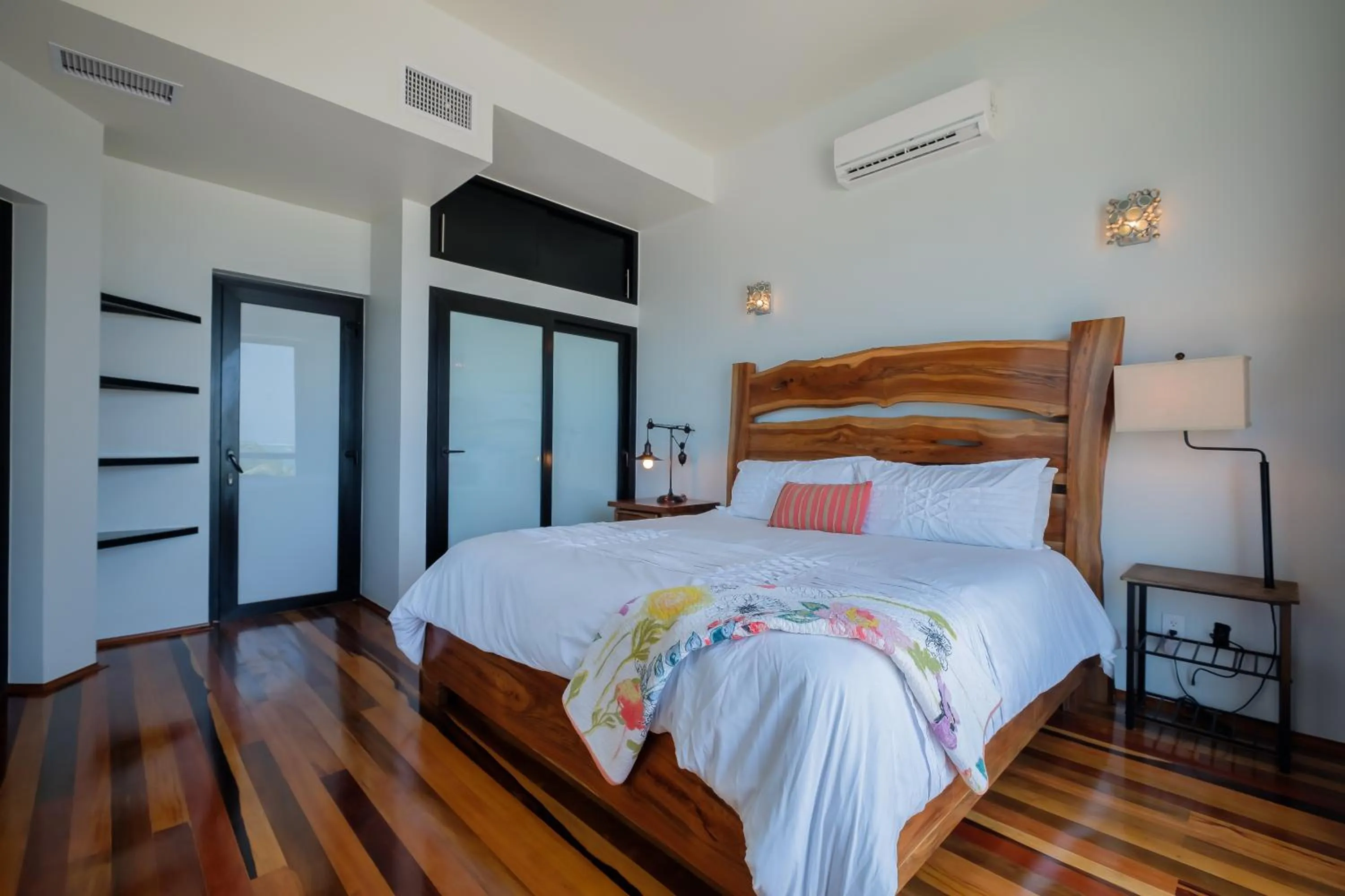 Bed in Diamante Beachfront Suites