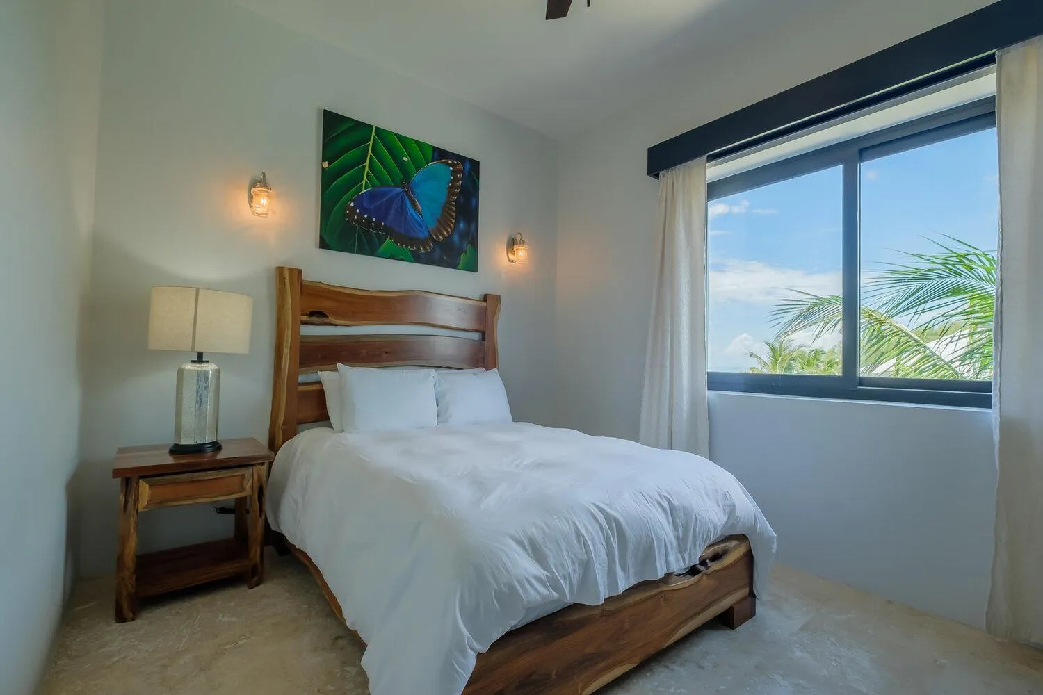 Bed in Diamante Beachfront Suites