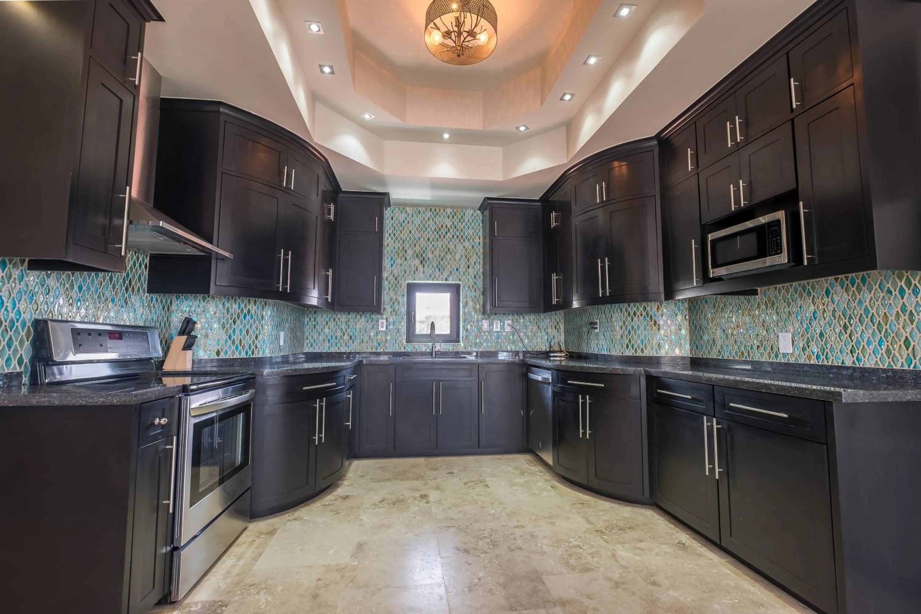 Kitchen or kitchenette in Diamante Beachfront Suites