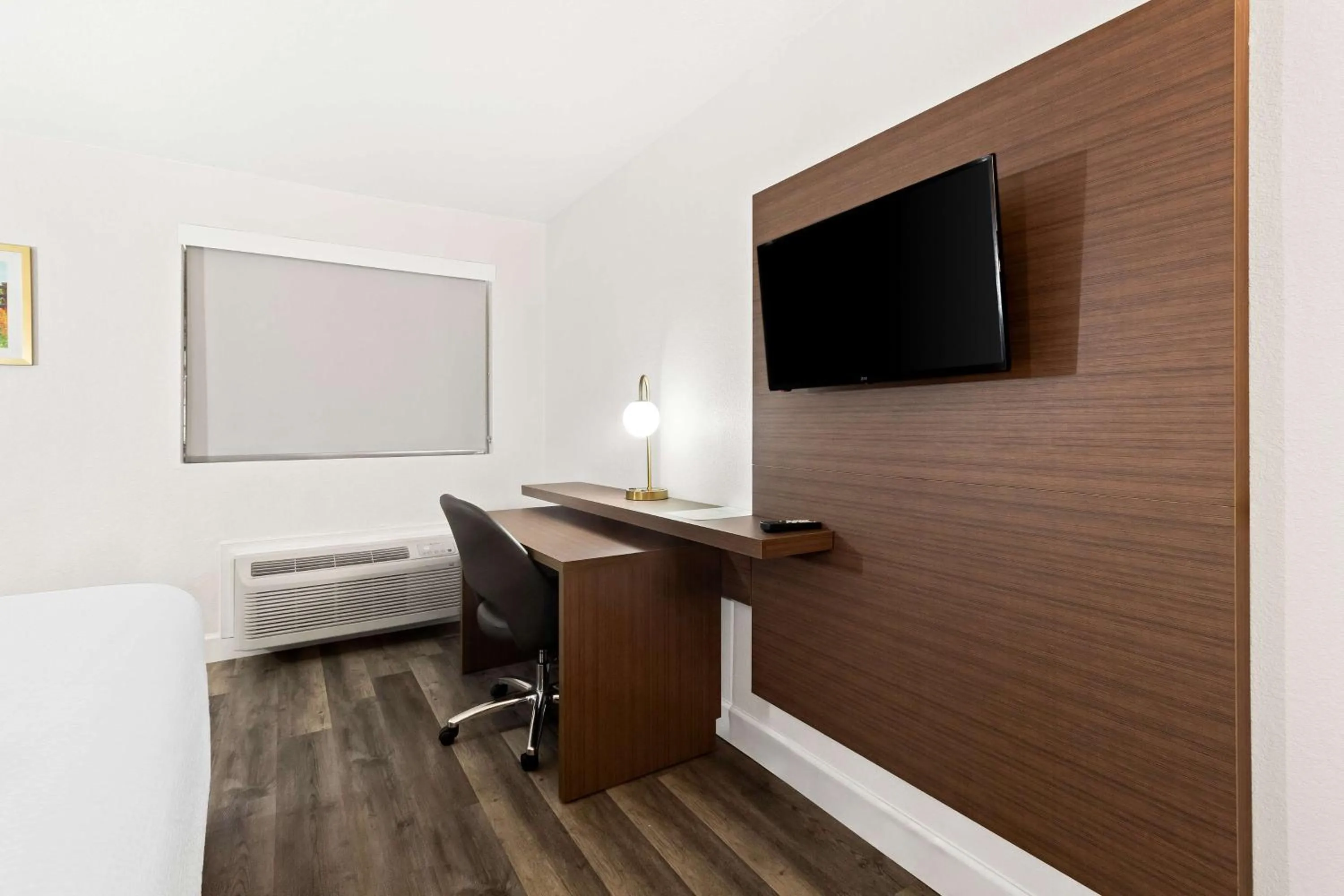 Bedroom in SureStay Hotel by Best Western Groves